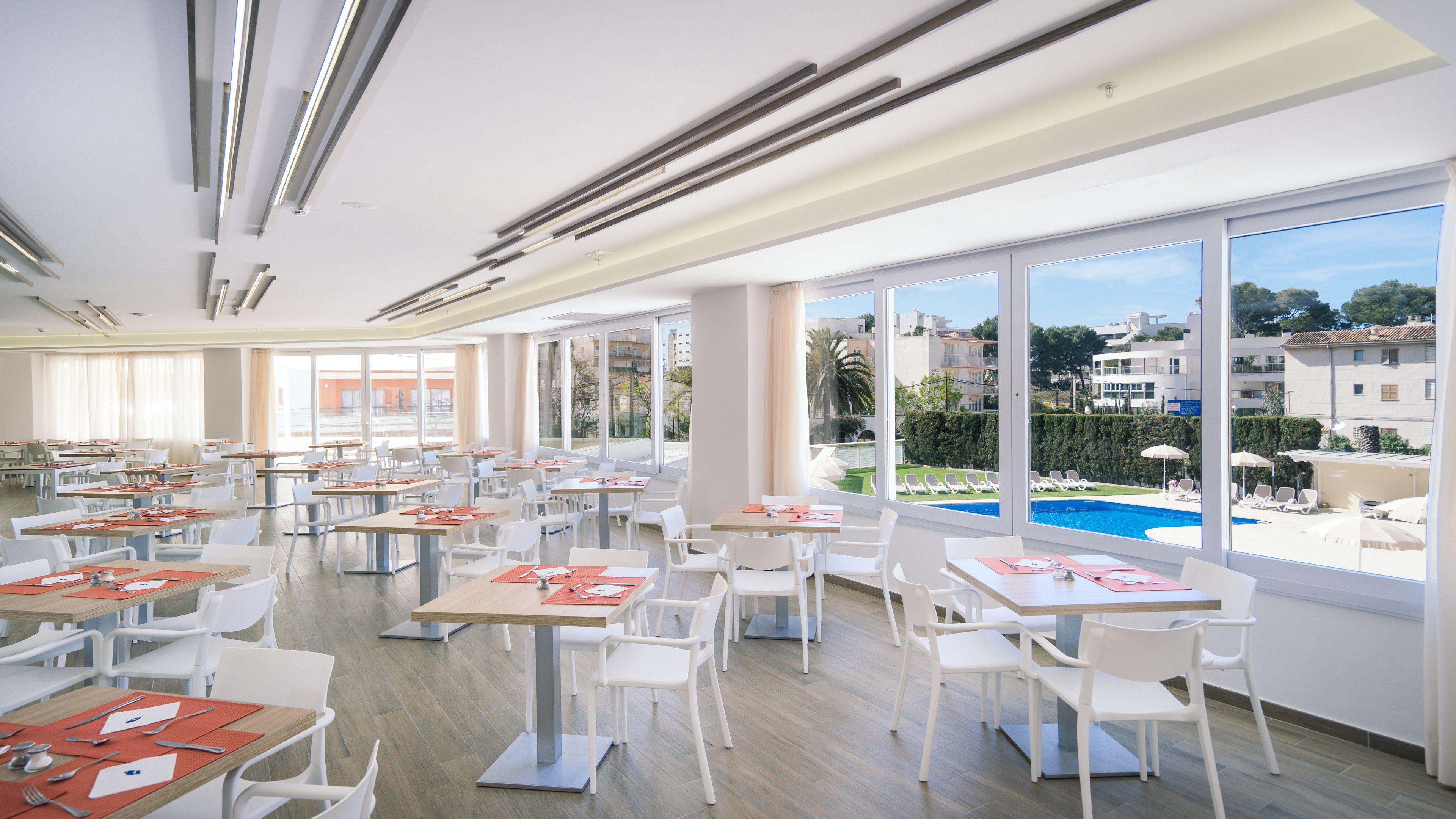 Indoor dining room at THB Maria Isabel Hotel
