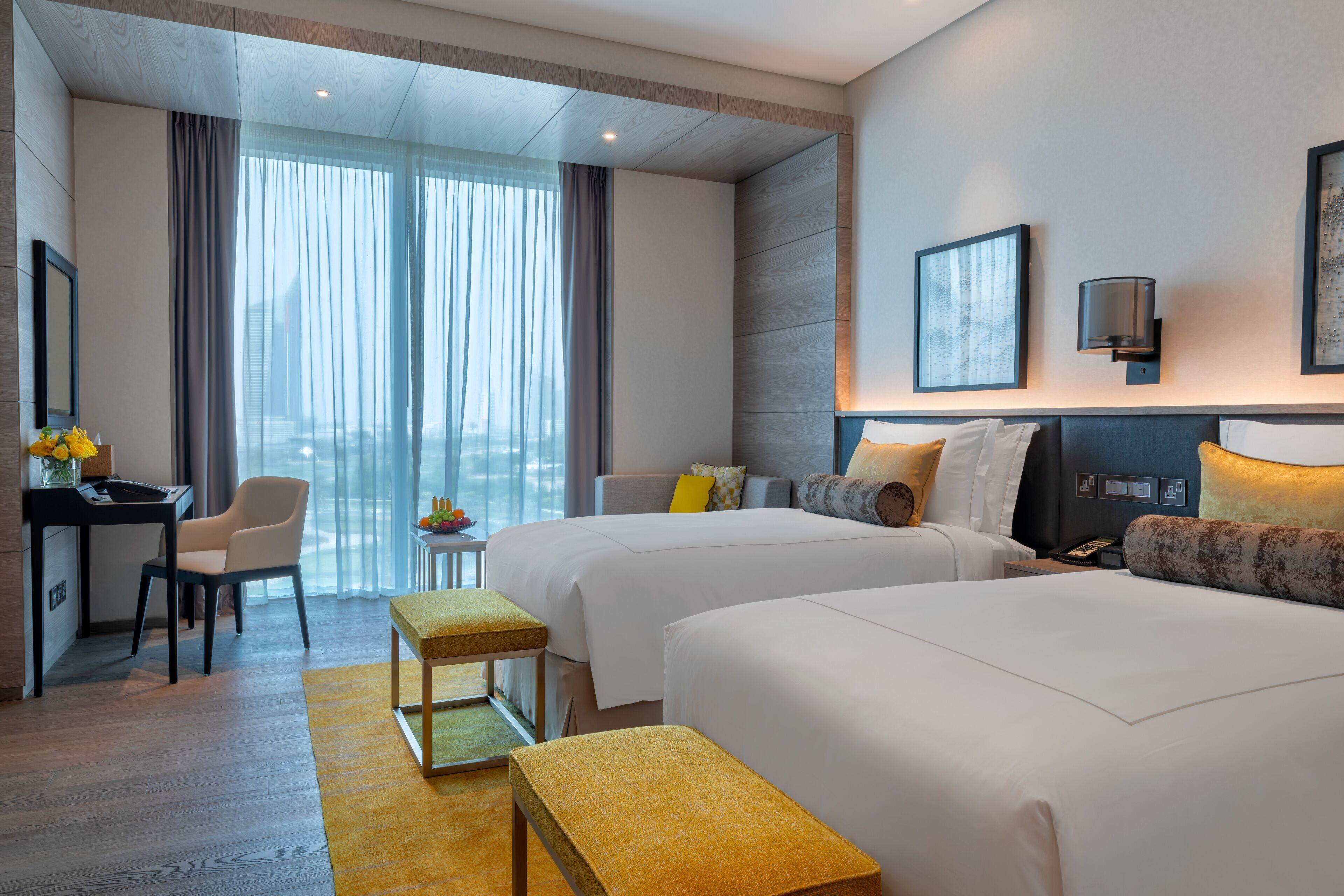 Twin bed suite at Taj Jumeirah Lakes Towers