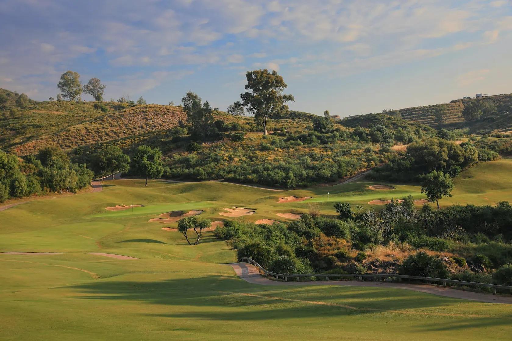 A well maintained fairway nestled with sand bunkers at Tamisa Golf Hotel