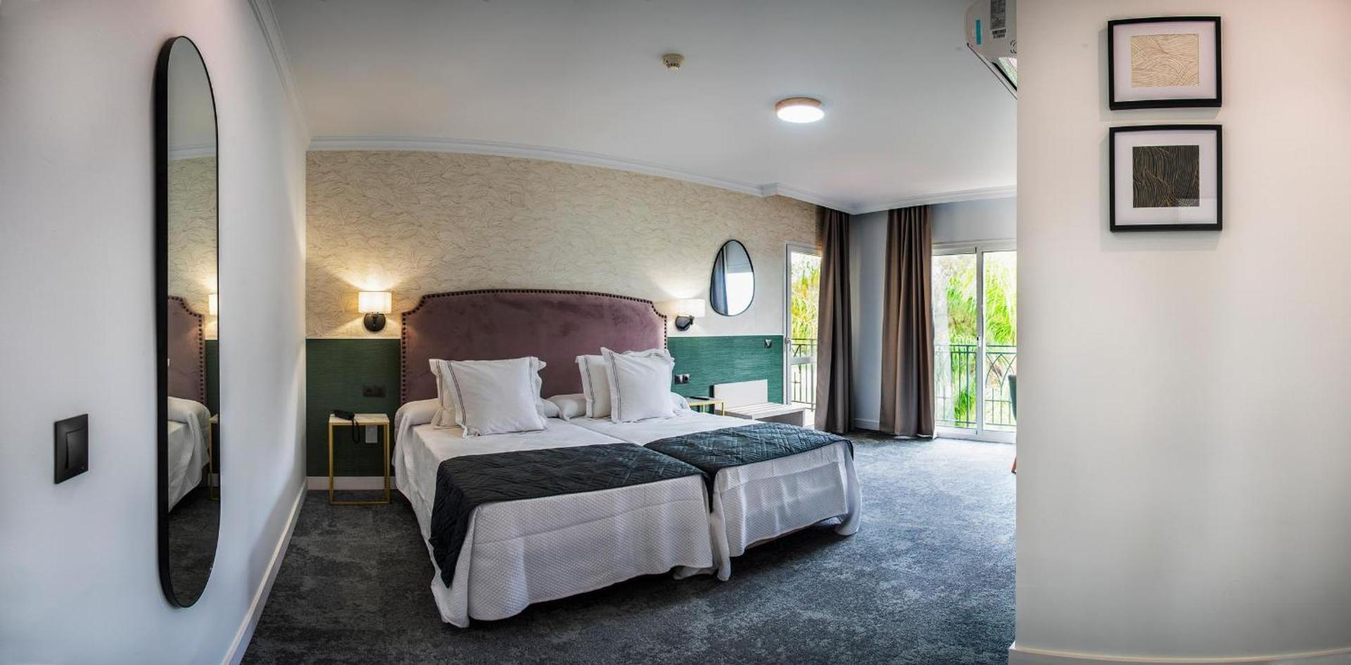 Spacious twin bed suite at Tamisa Golf Hotel