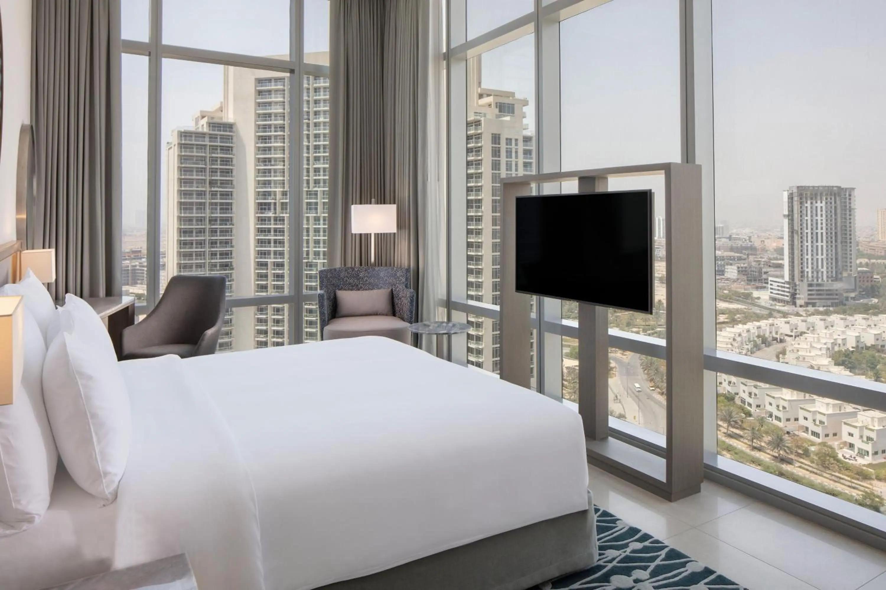 Modern double bed suite with panoramic window views at Smart, Modern Dubai Base