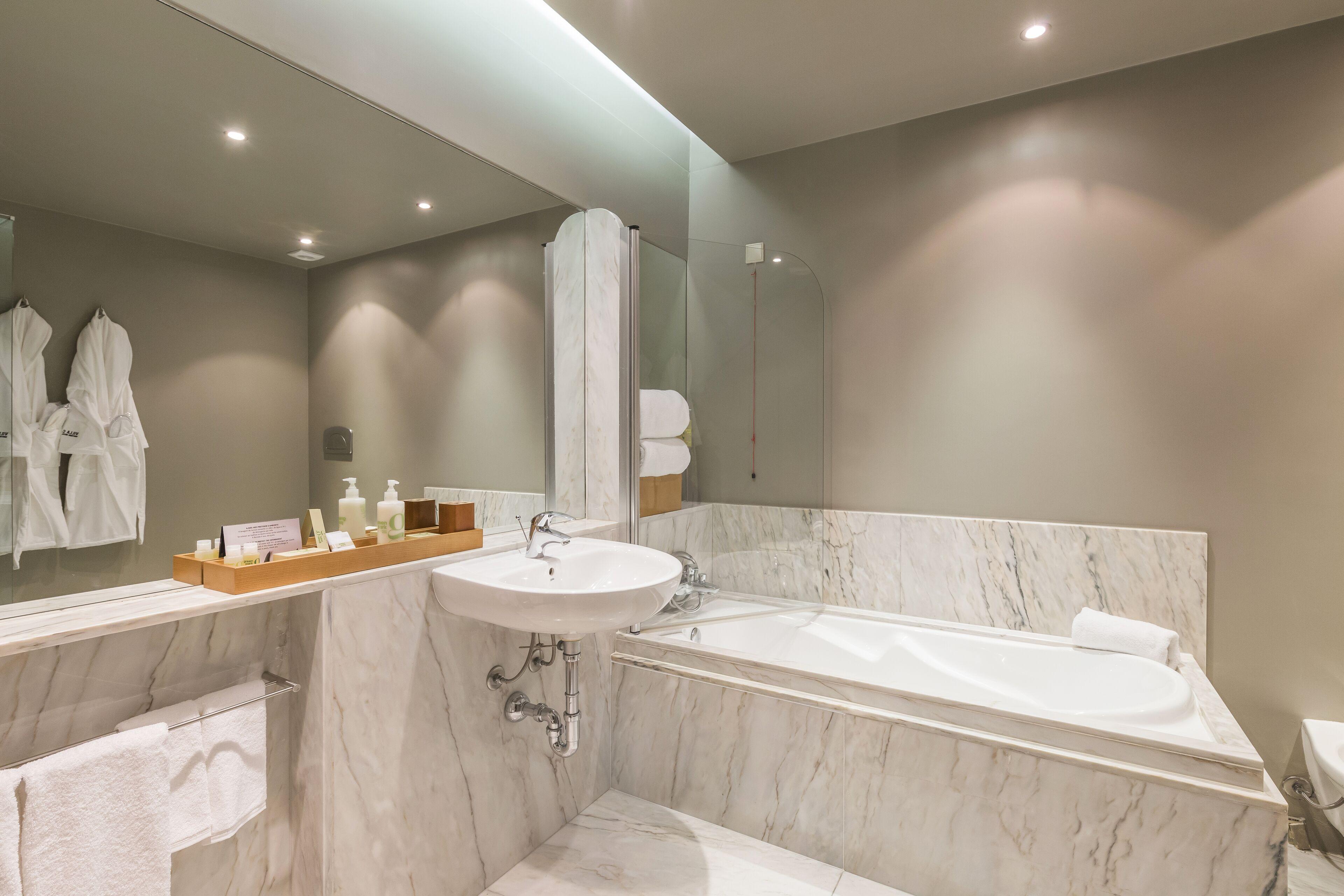Bathroom as part of a suite at Villa C Boutique Hotel