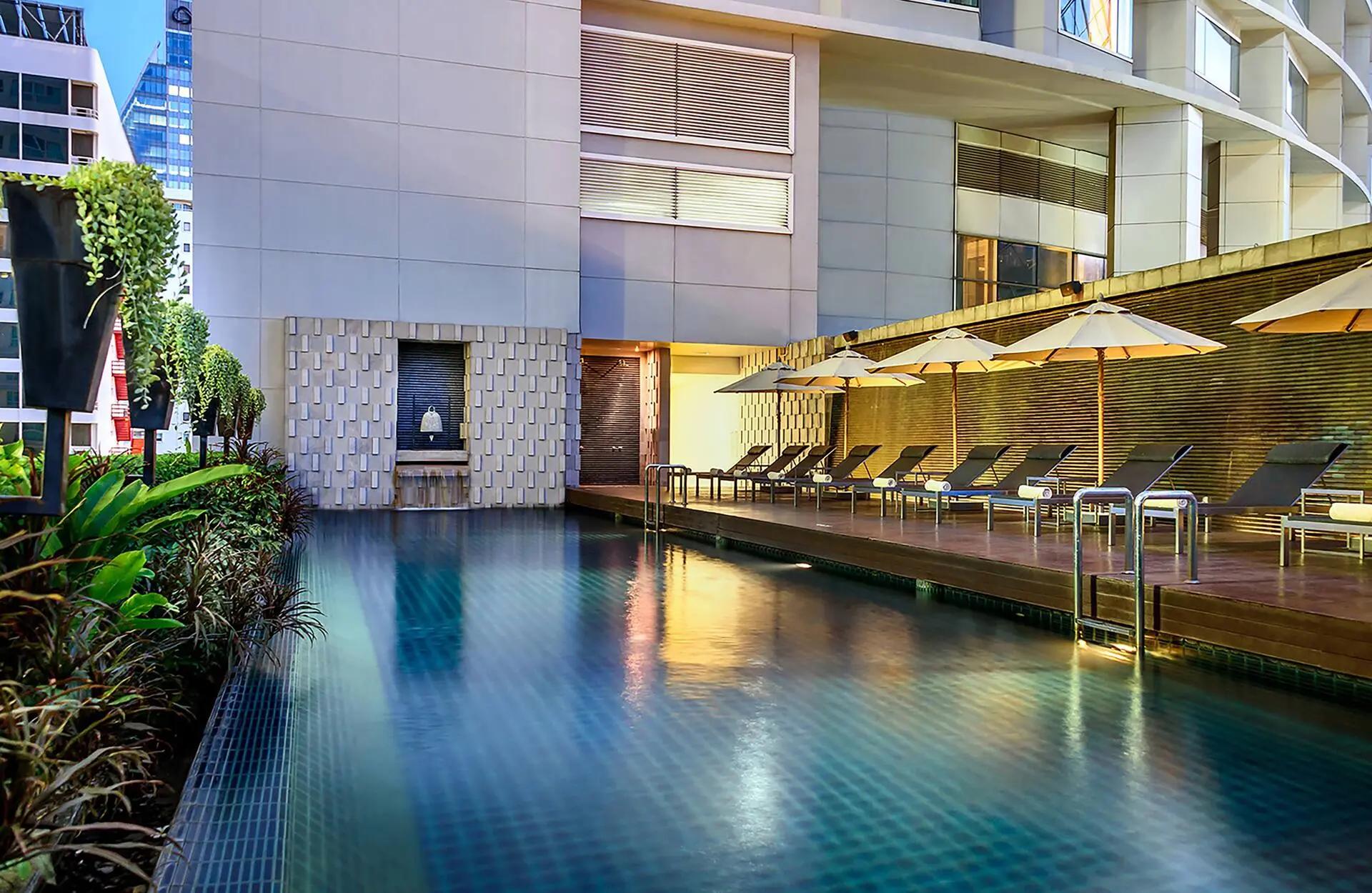 Outdoor swimming pool at Hilton Bangkok Grande Asoke
