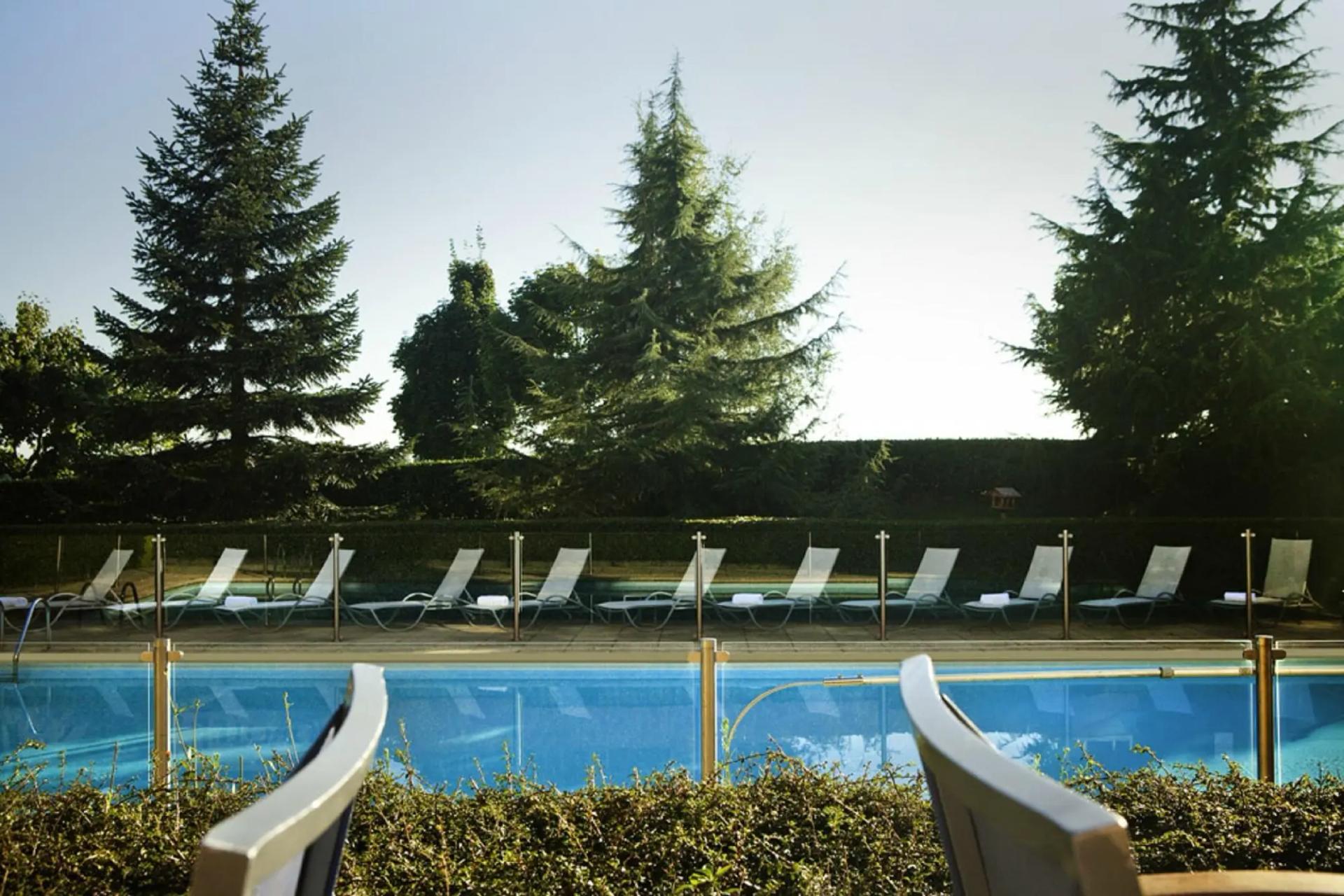 Outdoor swimming pool at Novotel Saint Quentin en Yvelines
