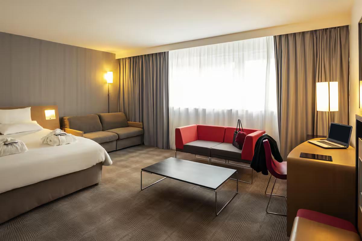 Spacious double bed suite at Novotel Saint Quentin en Yvelines