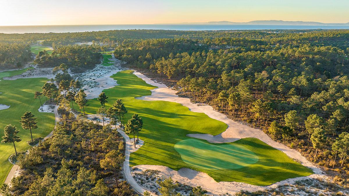 Aerial view of a well maintained fairway leading to a smooth green