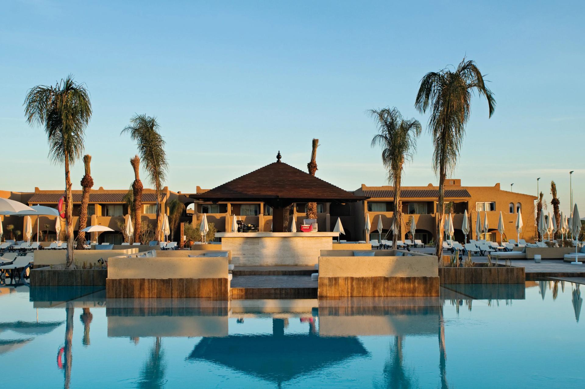 Panoramic view of the outdoor pool at Clubhotel Riu Tikida Palmeraie