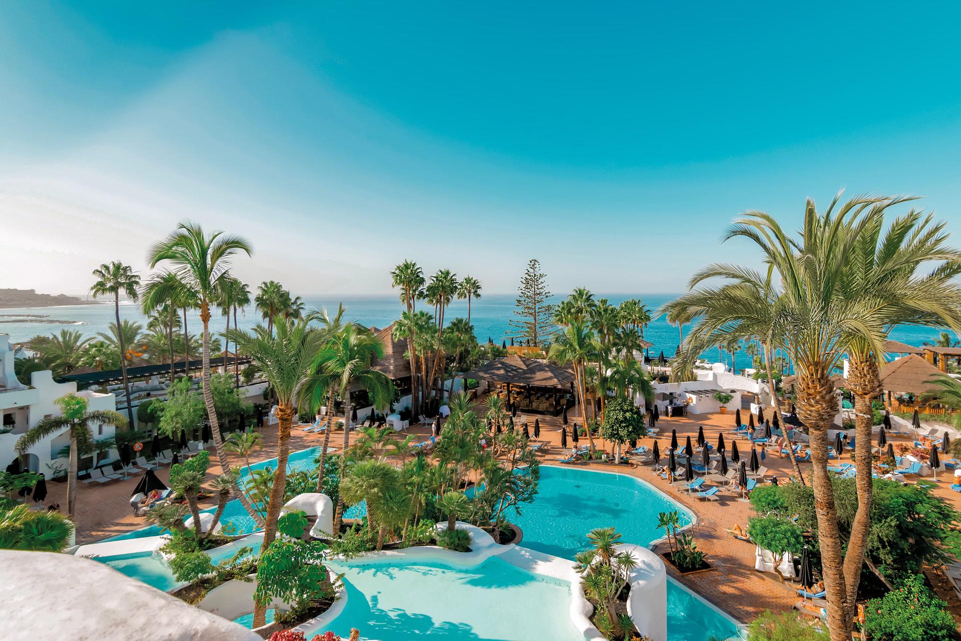 Overhead view of the outdoor pool at Dreams Jardin Tropical Resort & Spa
