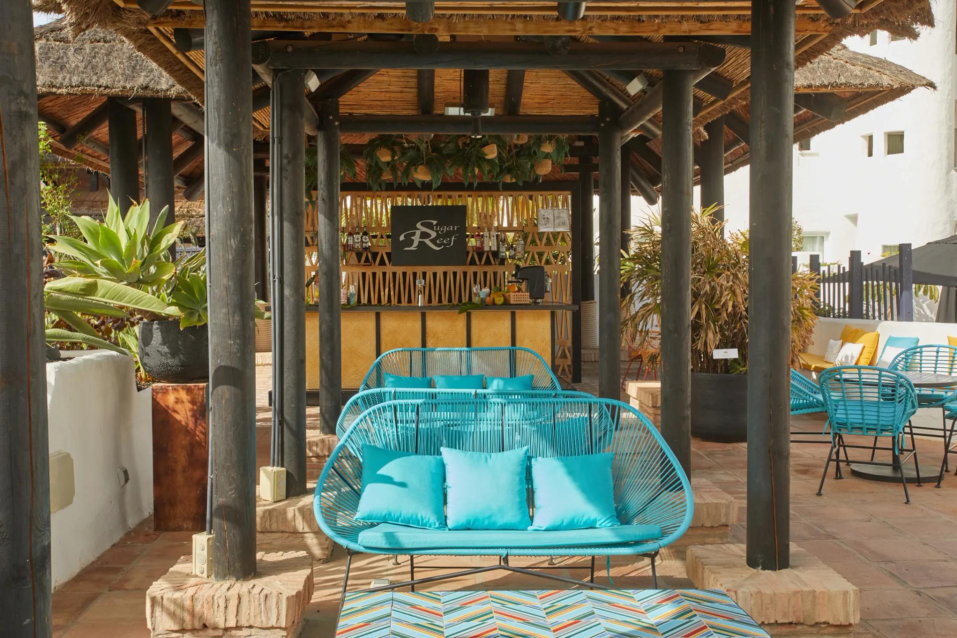 Outdoor bar at Dreams Jardin Tropical Resort & Spa