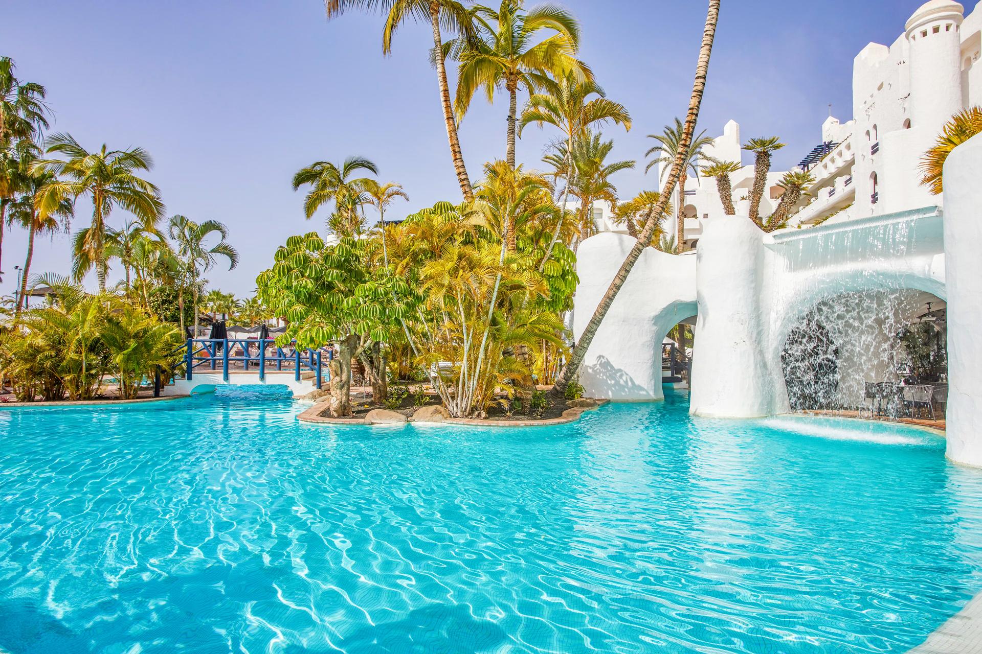 Panoramic view of the outdoor pool at Dreams Jardin Tropical Resort & Spa