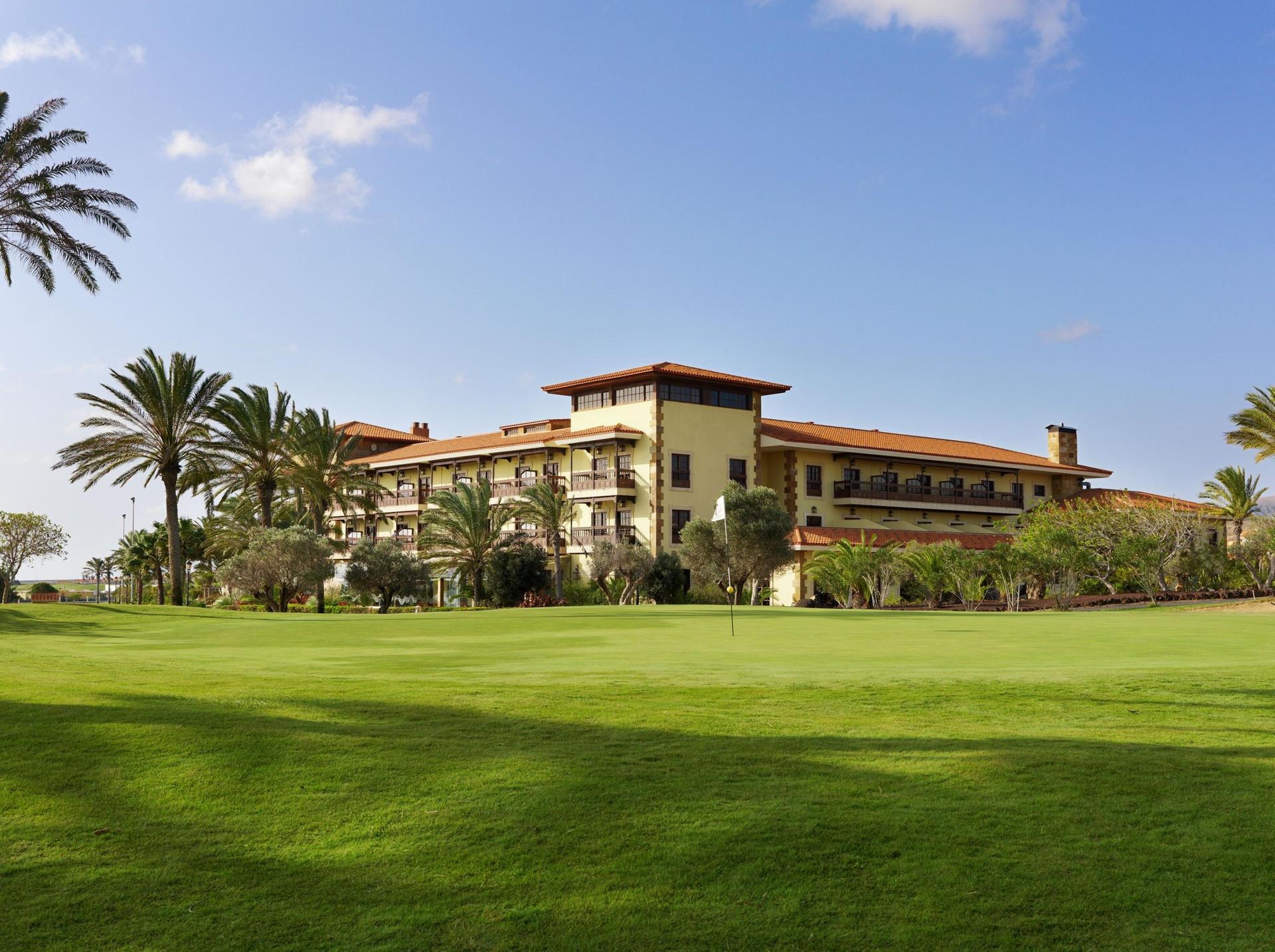 Panoramic view of the Elba Palace Golf & Vital Hotel building overlooking the course