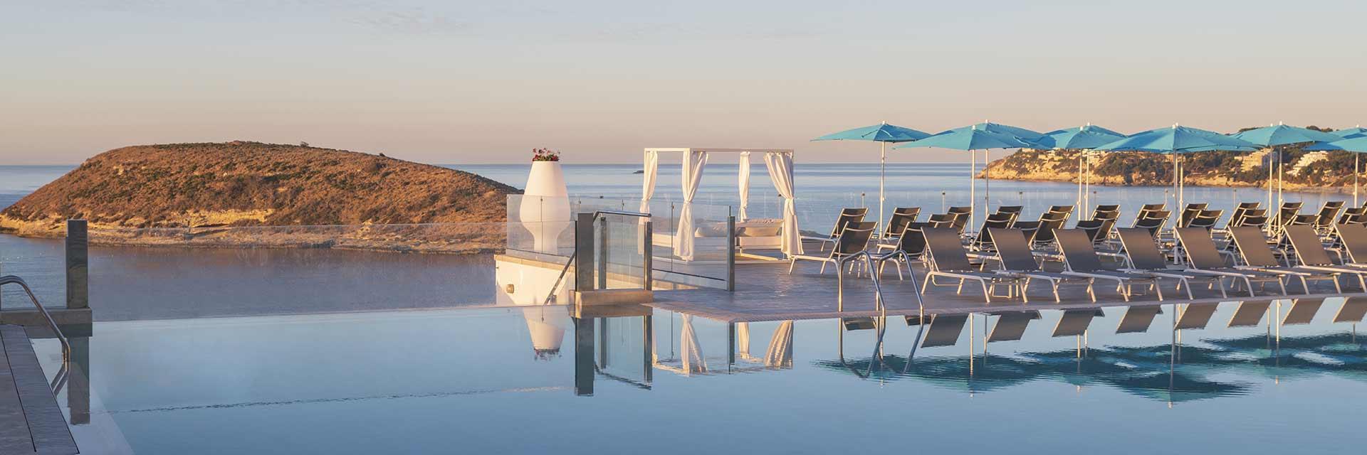 Outdoor swimming pool with coastal views at Elba Sunset Mallorca & Thalasso Spa