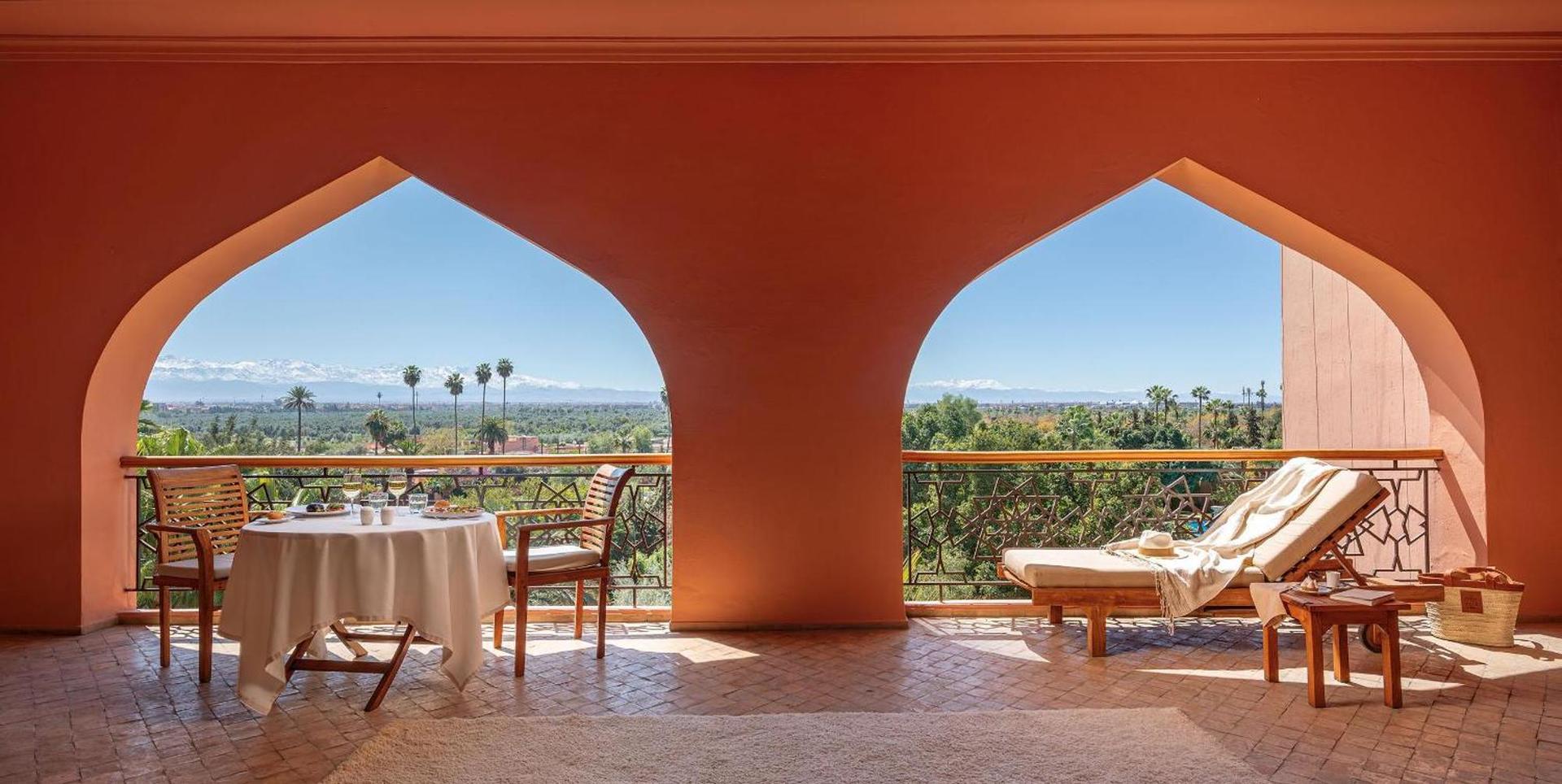 Balcony lounging area at Es Saadi Marrakech Resort – Palace