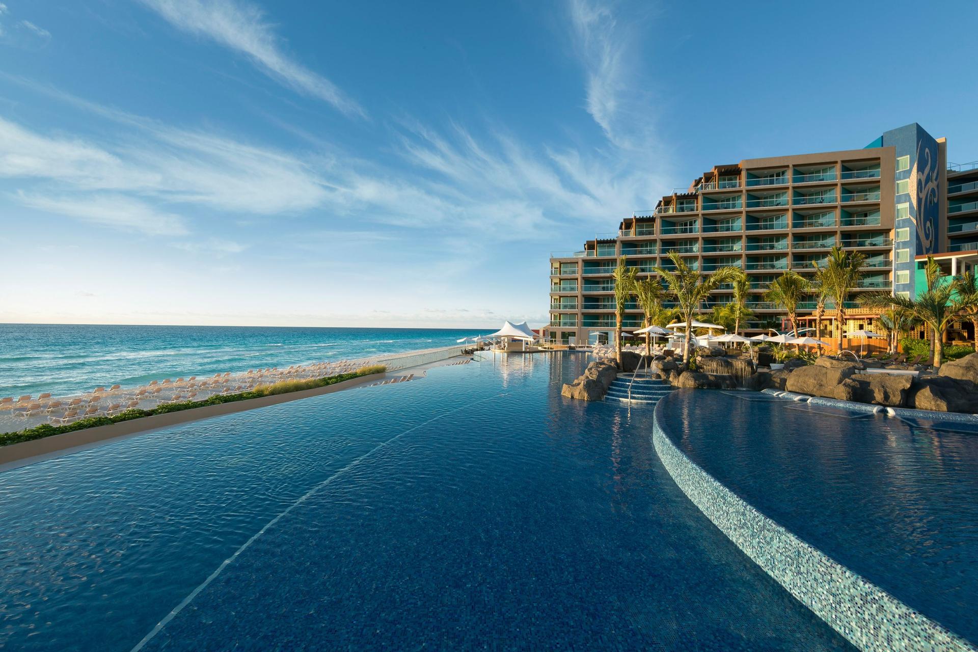 Panoramic view of the outdoor swimming pool at Hard Rock Hotel Cancun