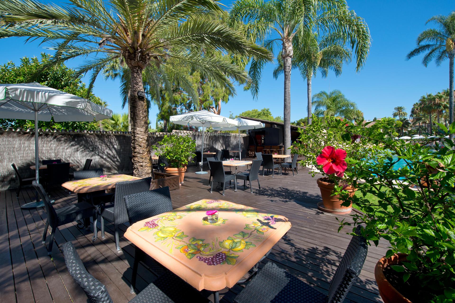 Poolside lounging area at Hotel BlueBay Banús