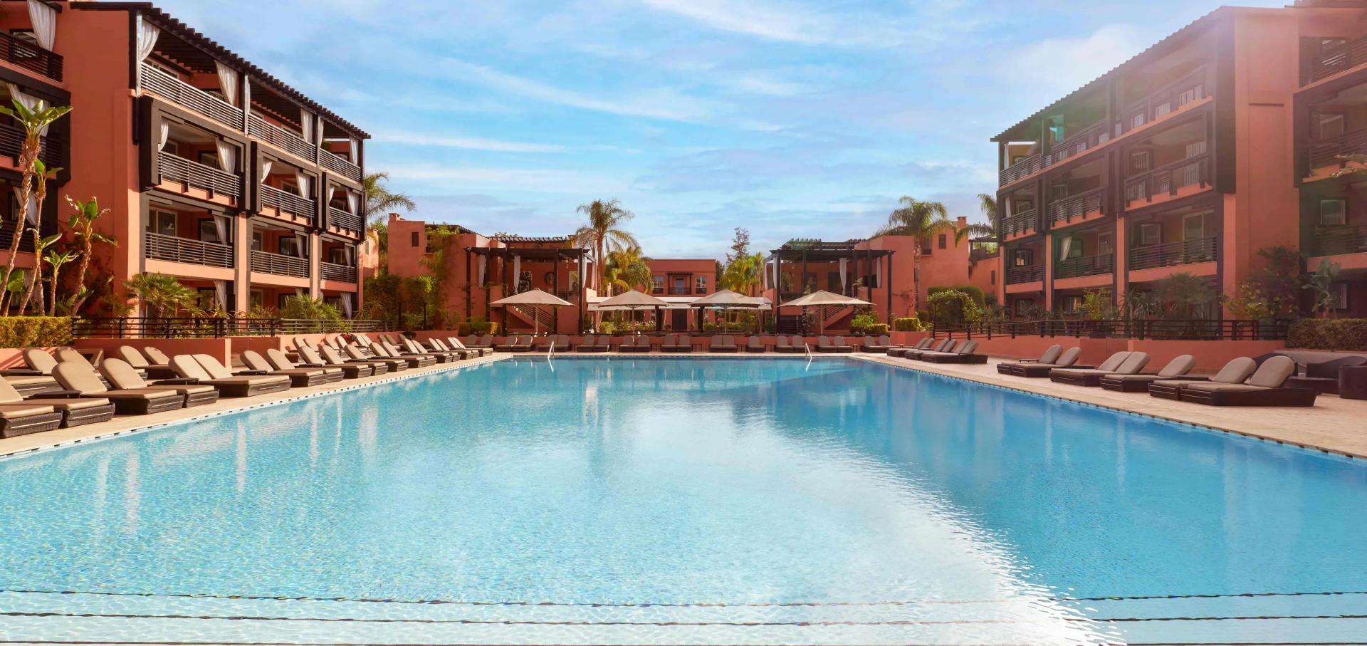 Outdoor swimming pool at Hotel & Ryads Barrière Le Naoura