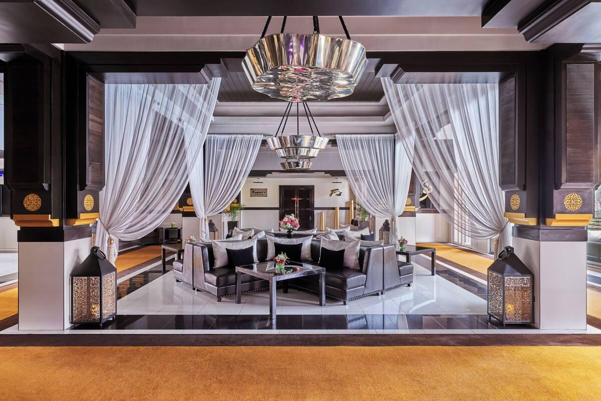 Lounging area at the reception of Hotel & Ryads Barrière Le Naoura