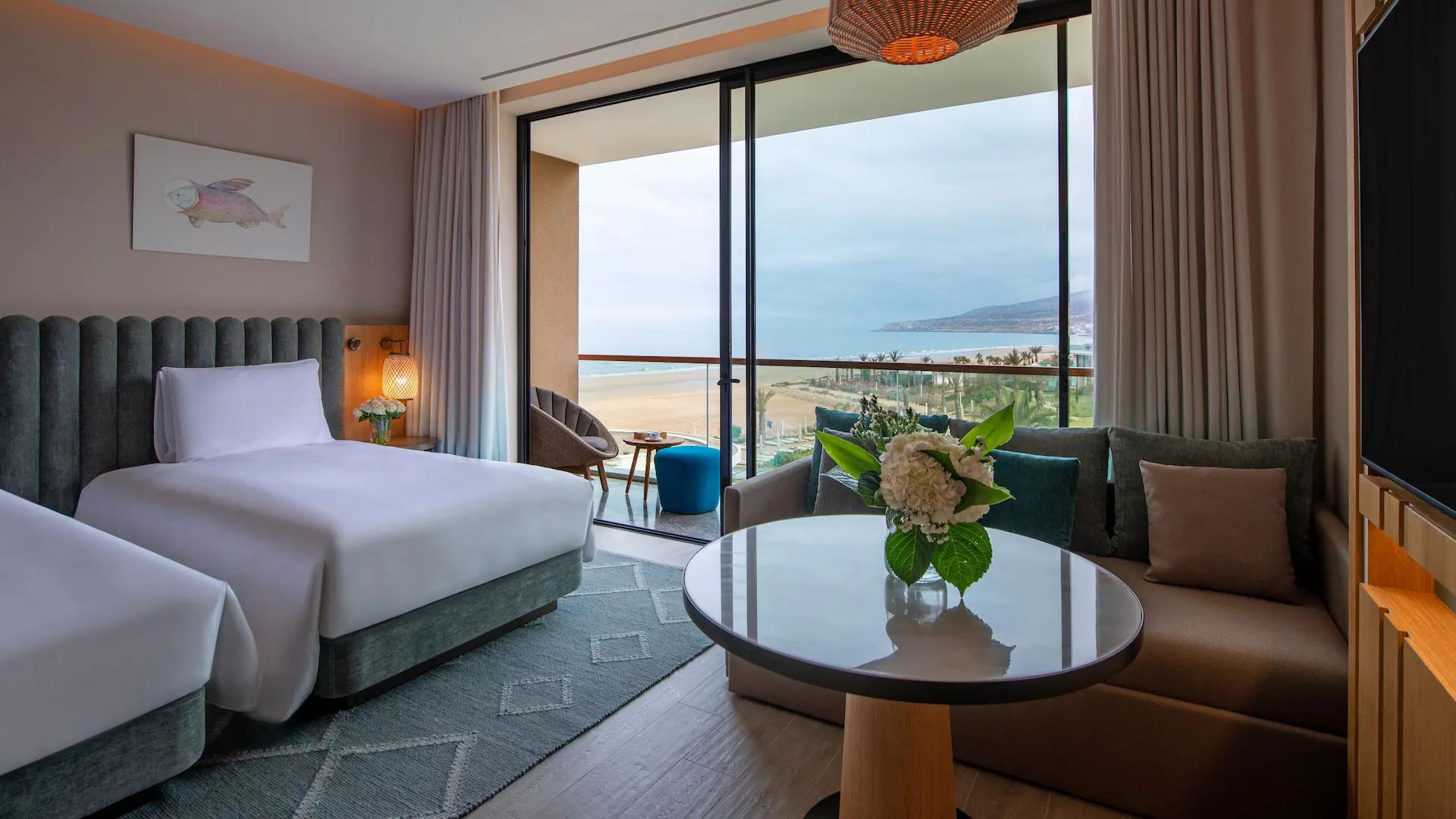 Modern double bed suite with balcony views at Hyatt Regency Taghazout Bay