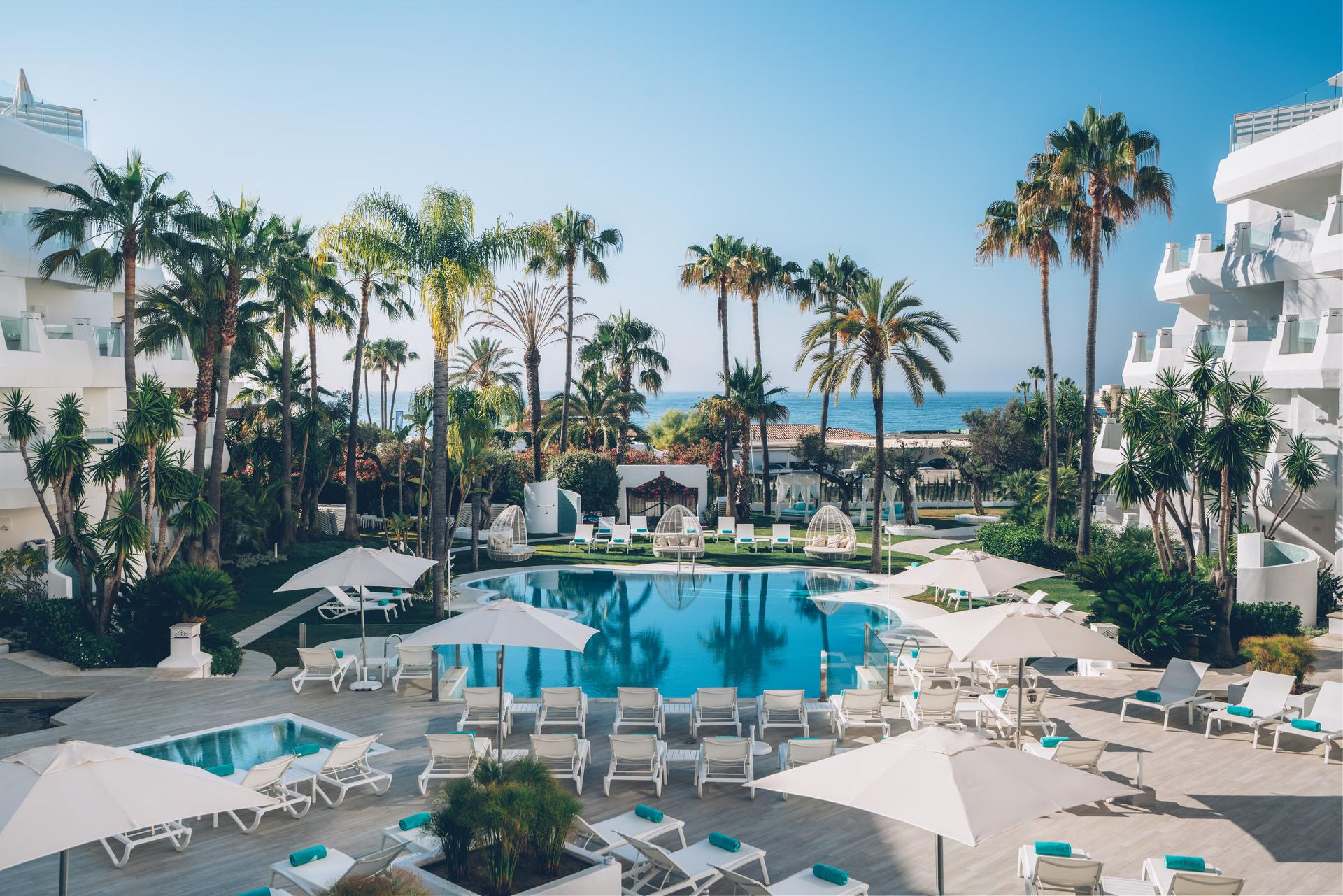 Panoramic view of the outdoor swimming pool at Iberostar Marbella Coral Beach