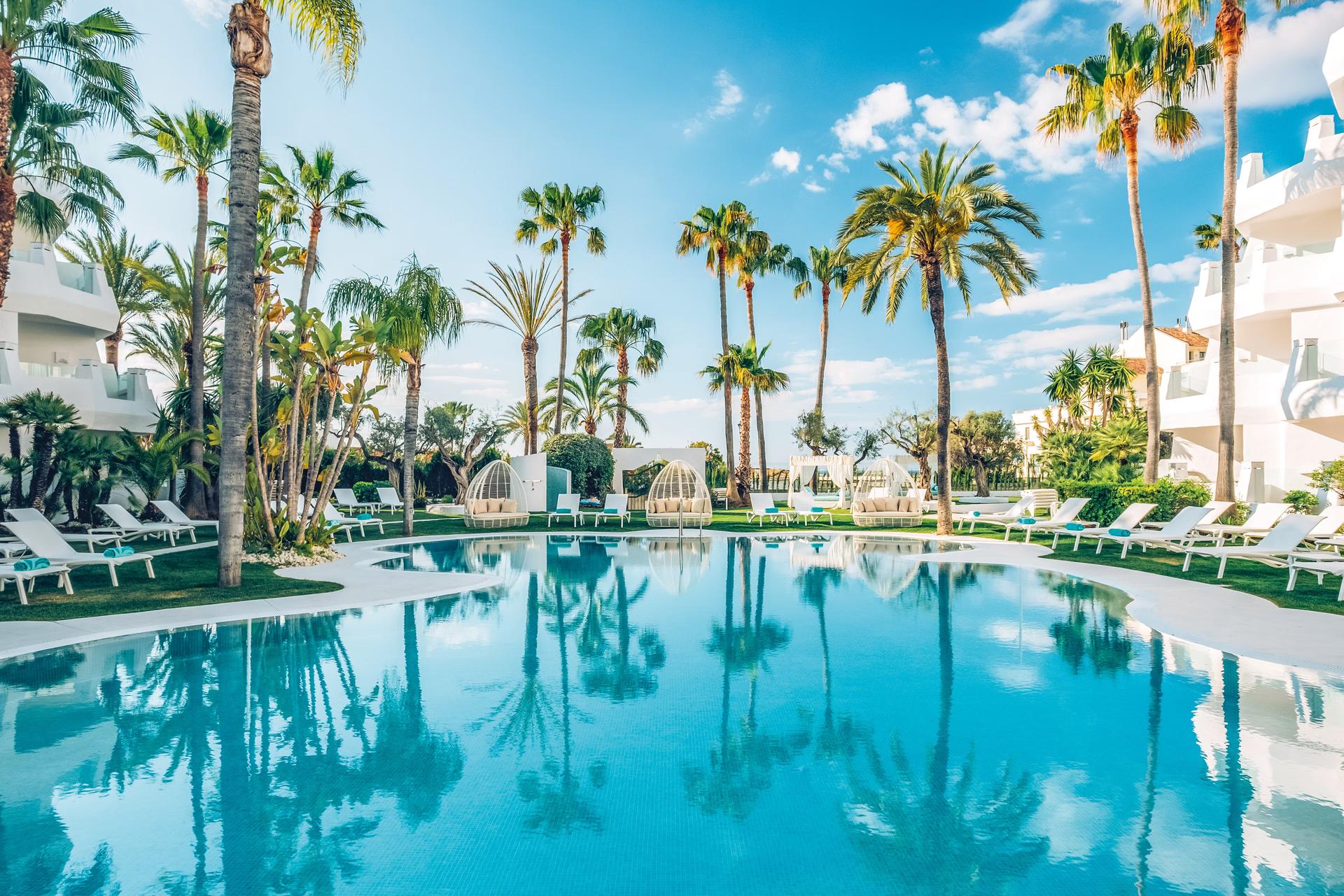 Panoramic view of the outdoor swimming pool at Iberostar Marbella Coral Beach