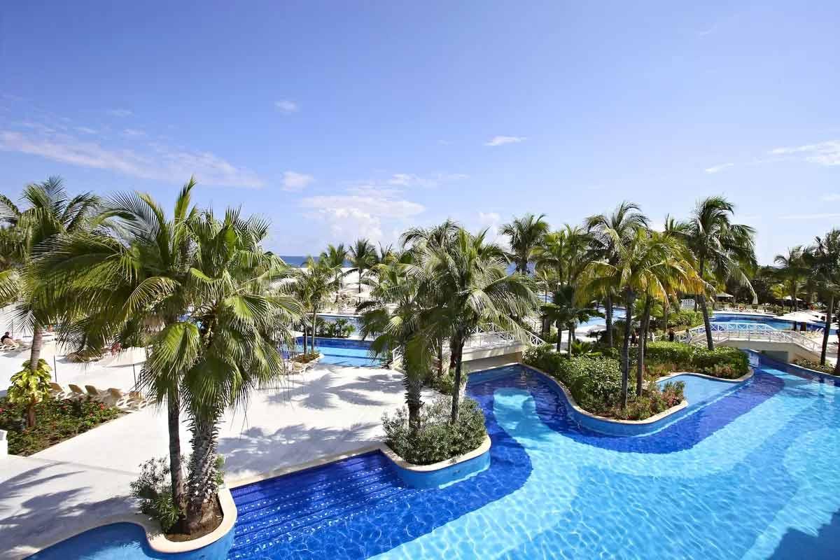 Panoramic view of the outdoor pool at Luxury Bahia Principe Akumal