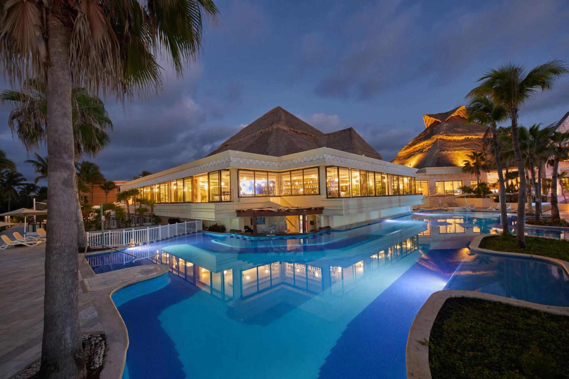 Panoramic view of the outdoor pool at Luxury Bahia Principe Akumal
