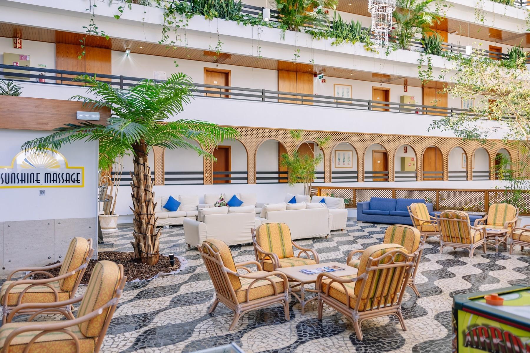 Indoor lounging area at Muthu Oura Praia Hotel