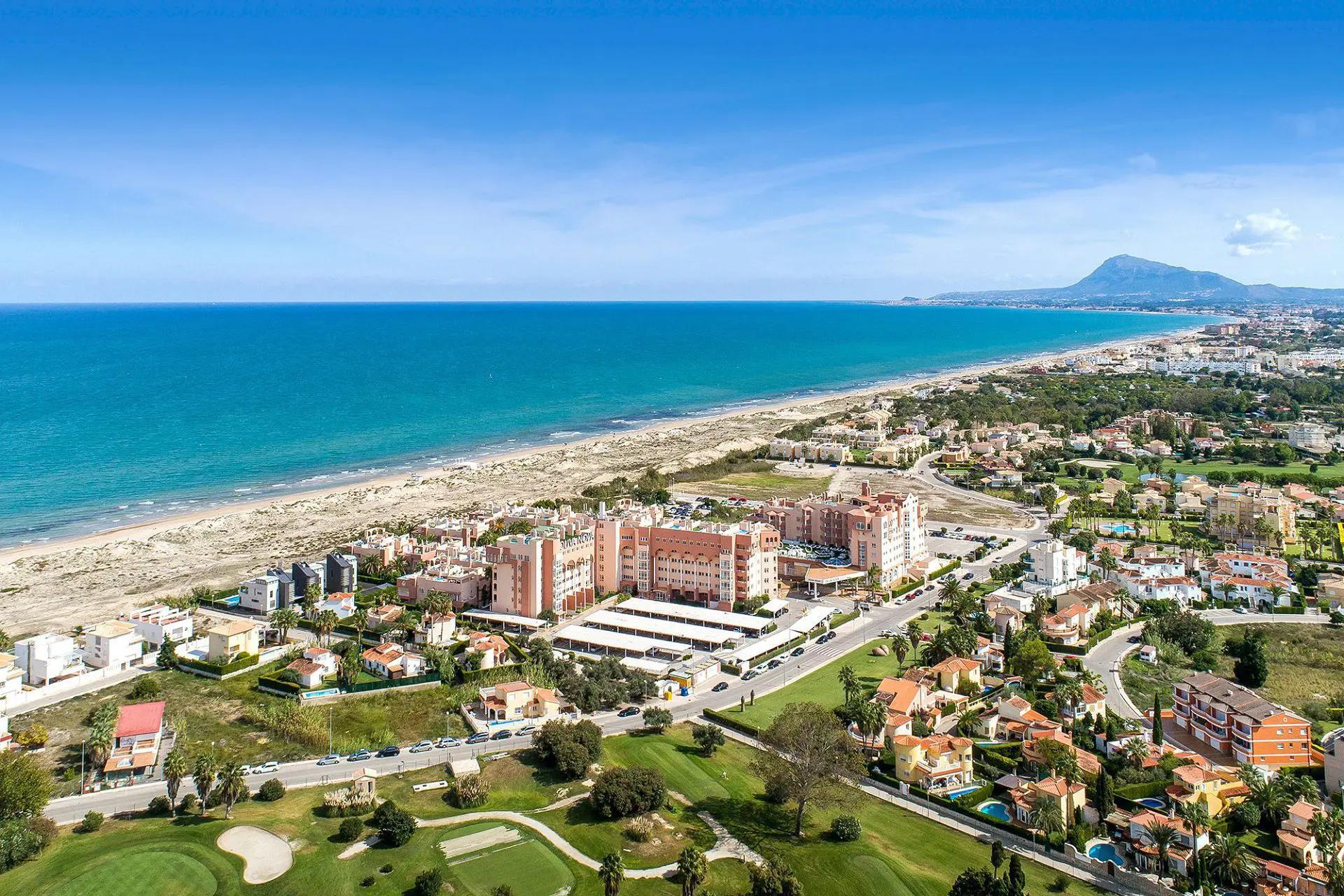 Aerial view looking down on the beachfront Oliva Nova Beach & Golf Hotel