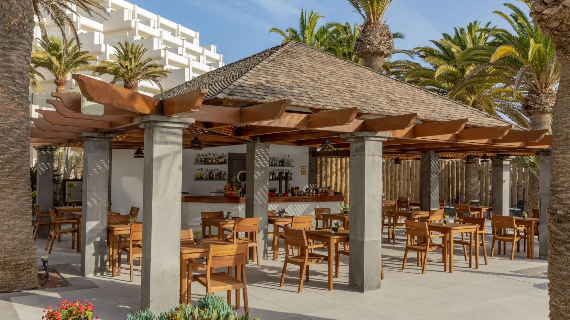 Outdoor bar and lounging area at Paradisus by Meliá Salinas Lanzarote