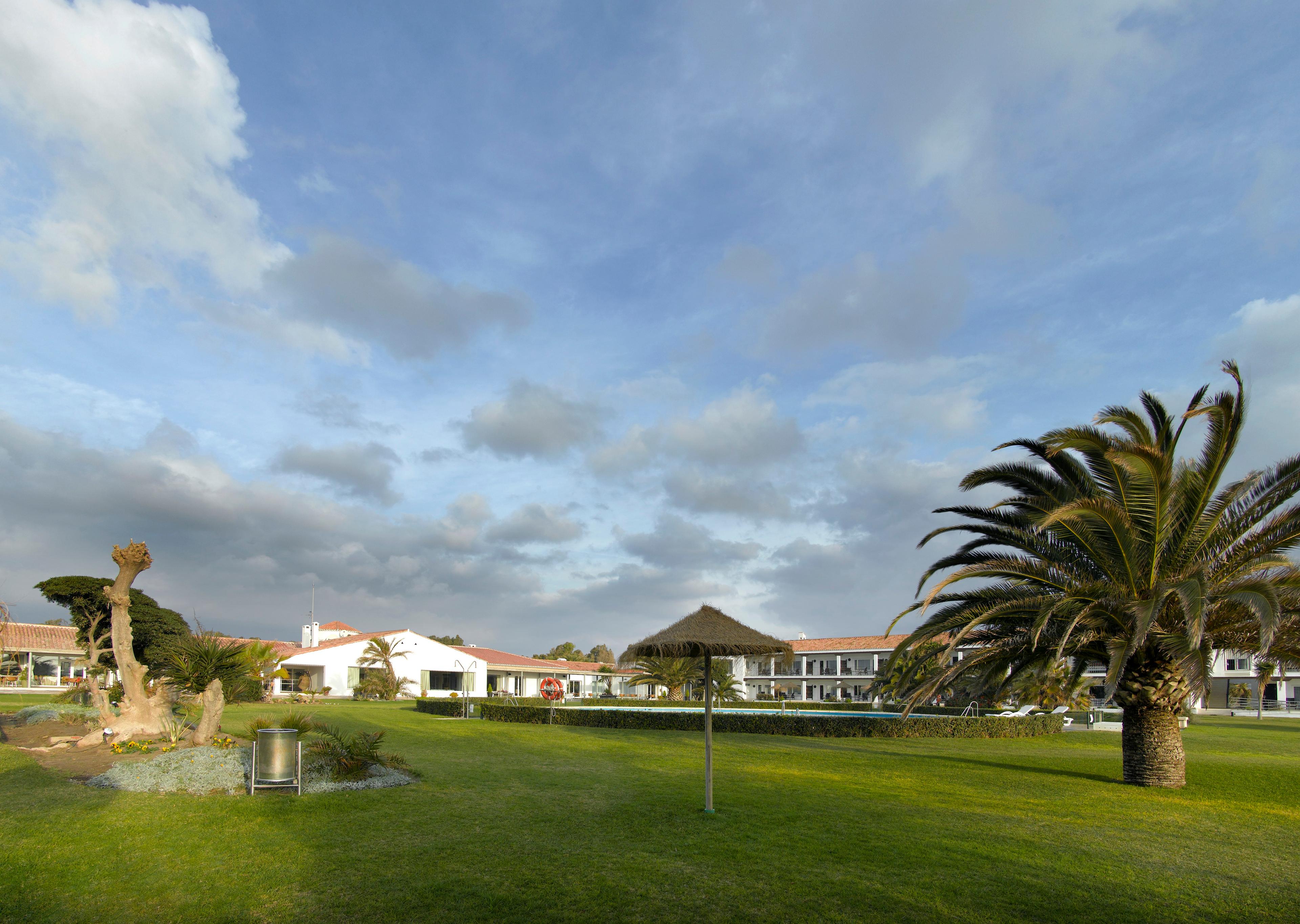 A well maintained fairway leading towards Parador de Malaga Golf