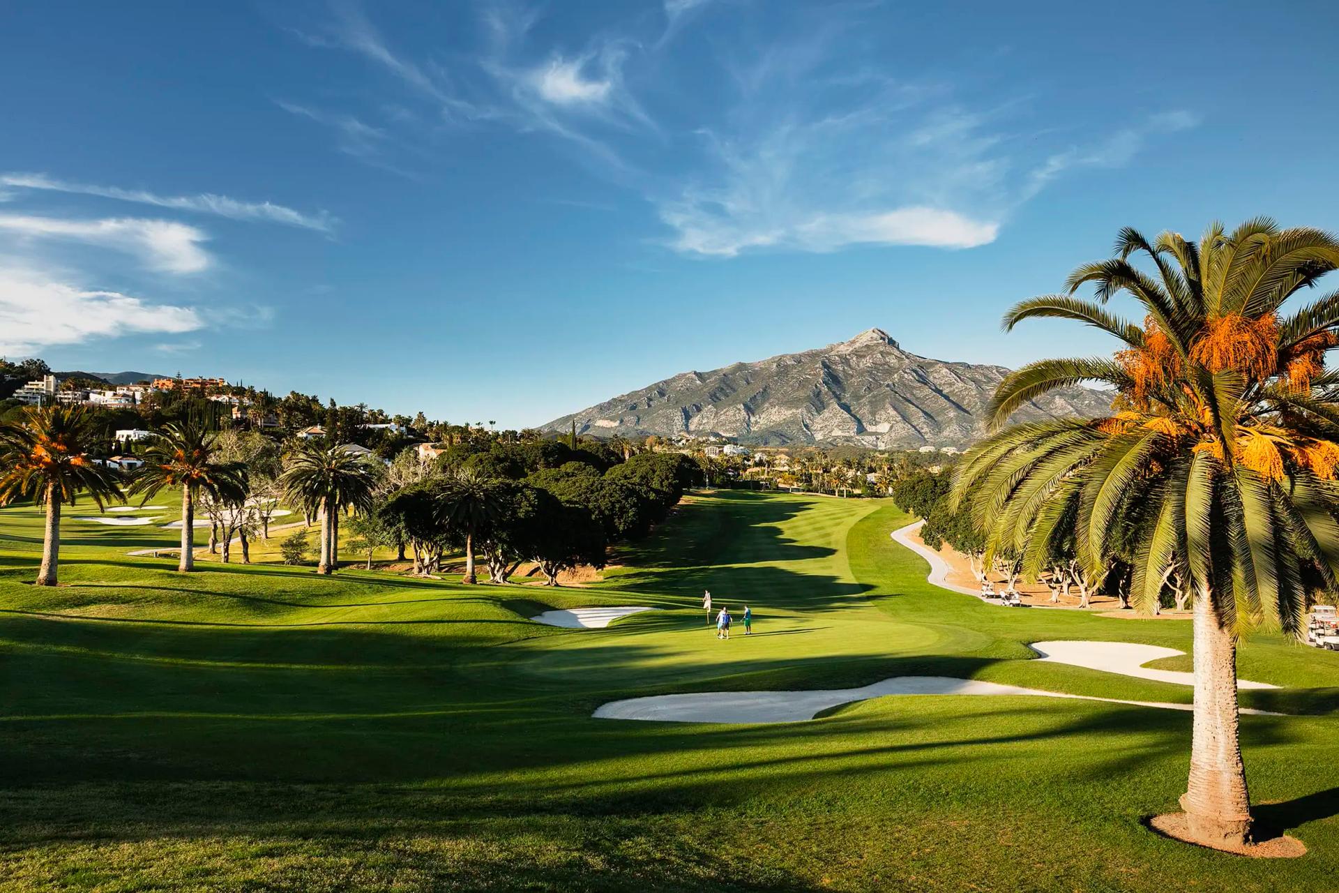 A well maintained fairway nestled with sand bunkers at Puente Romano Beach Resort