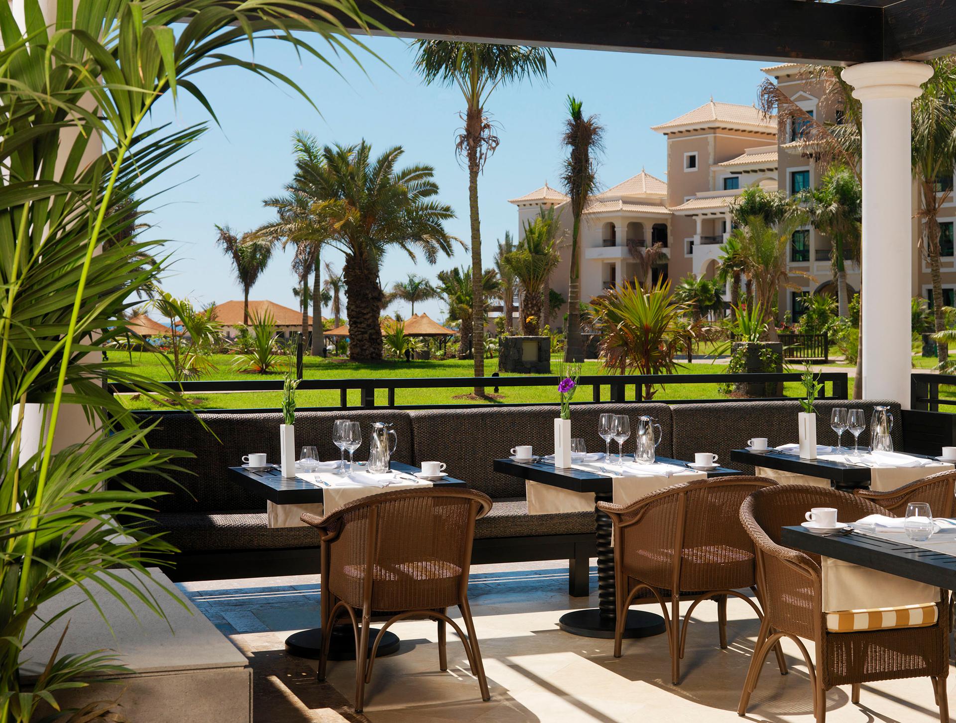 Outdoor dining area at RedLevel at Gran Meliá Palacio de Isora