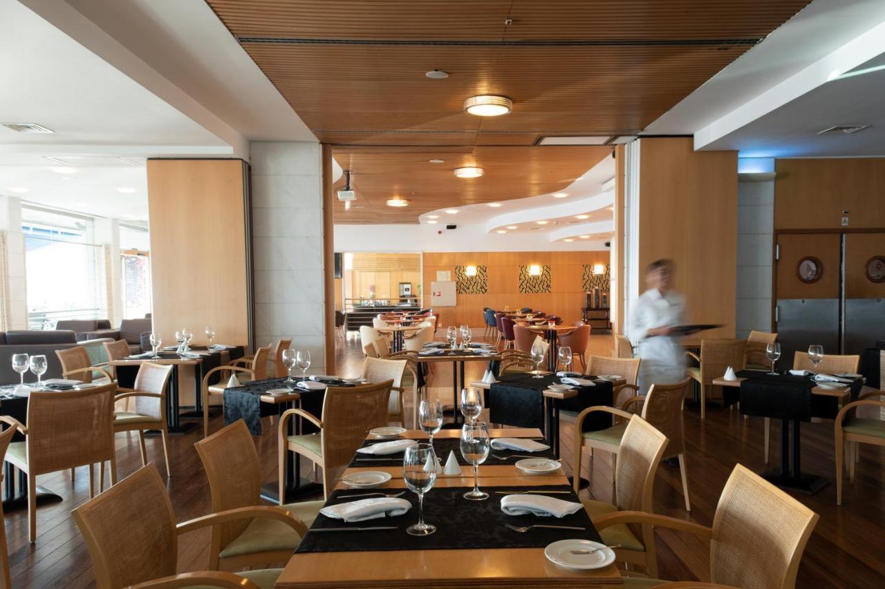 Indoor dining at SANA Sesimbra Hotel