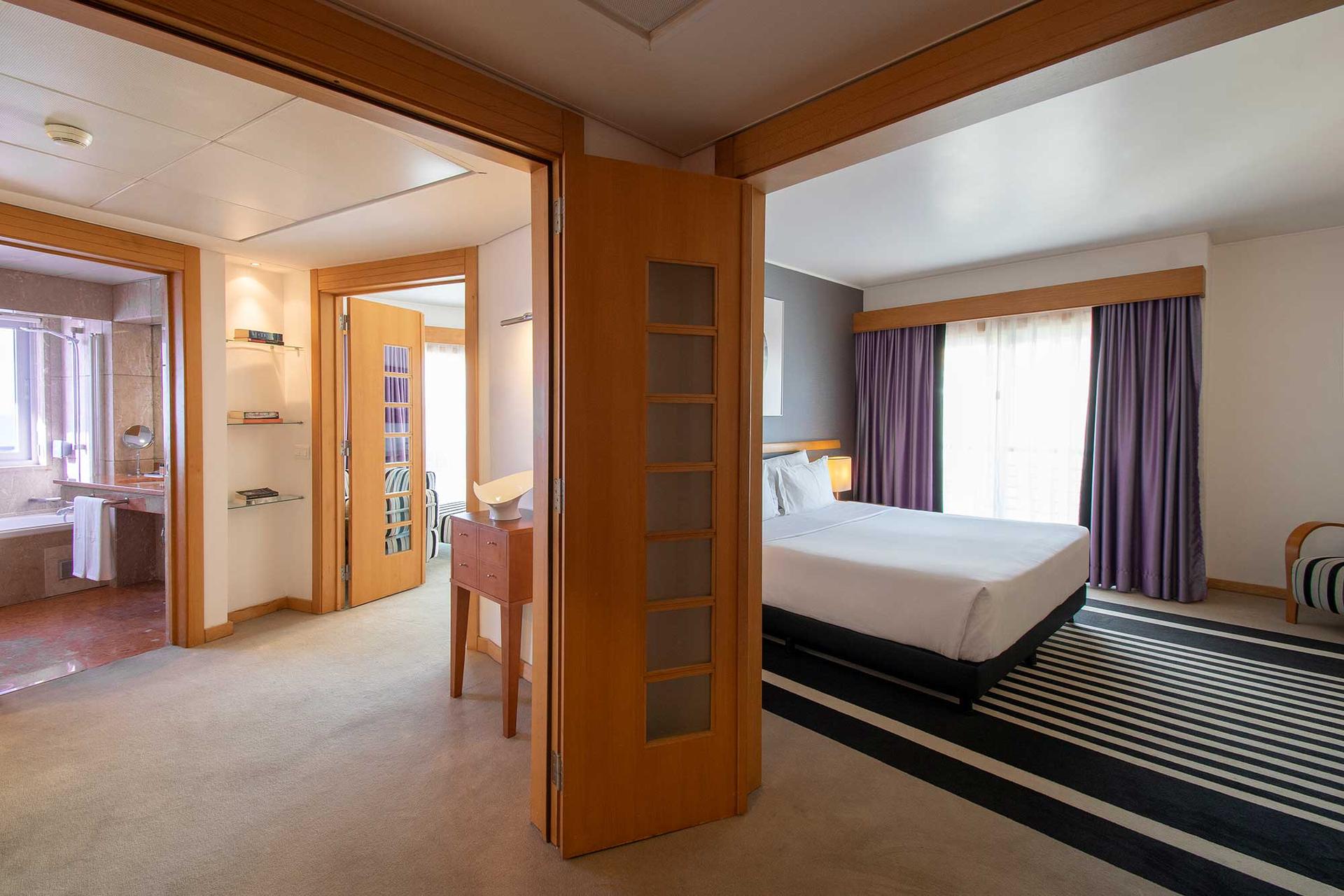 Spacious double bed suite at SANA Sesimbra Hotel