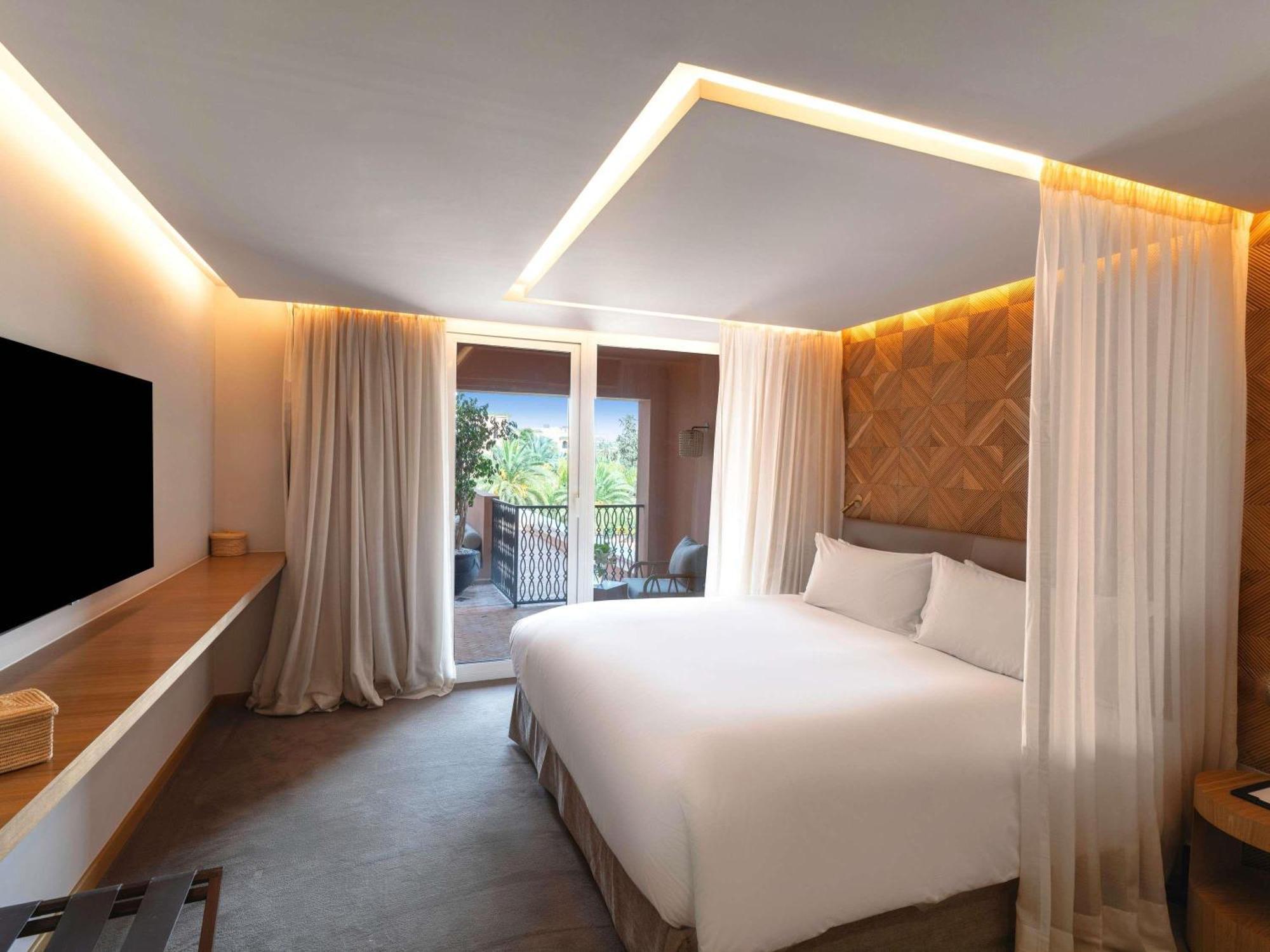 Luxurious double bed suite at Sofitel Marrakech Palais Imperial & Spa