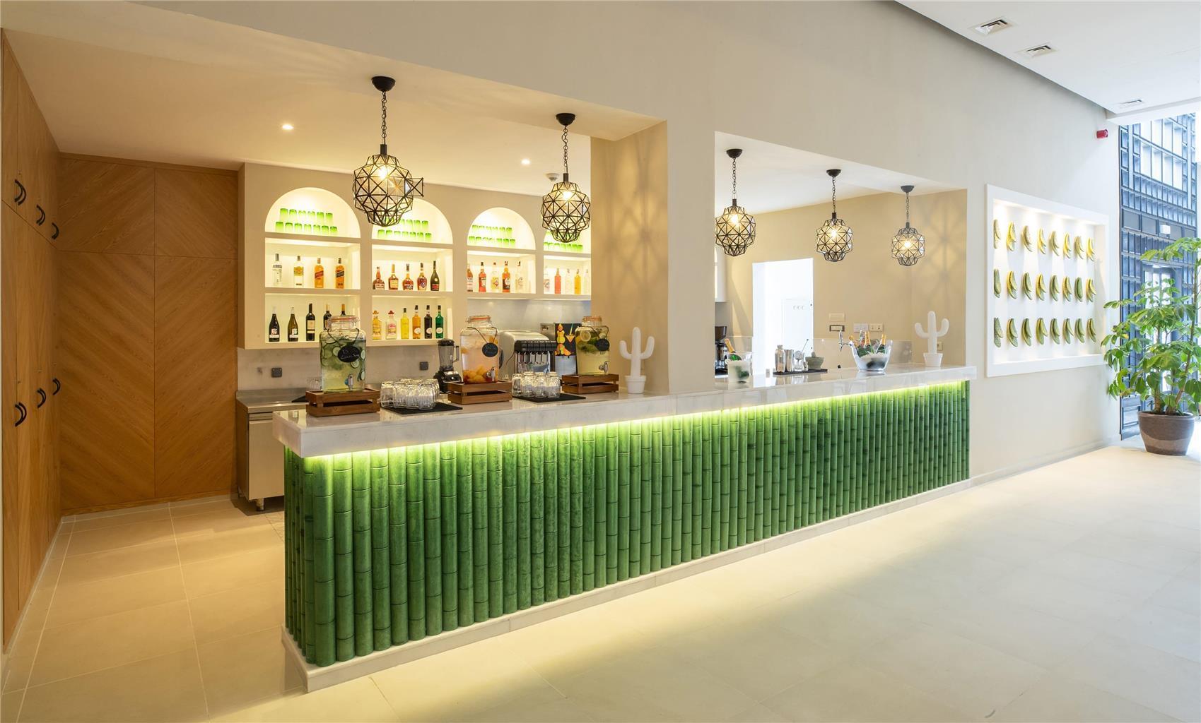 Indoor bar at Sol Oasis Marrakech by Melia