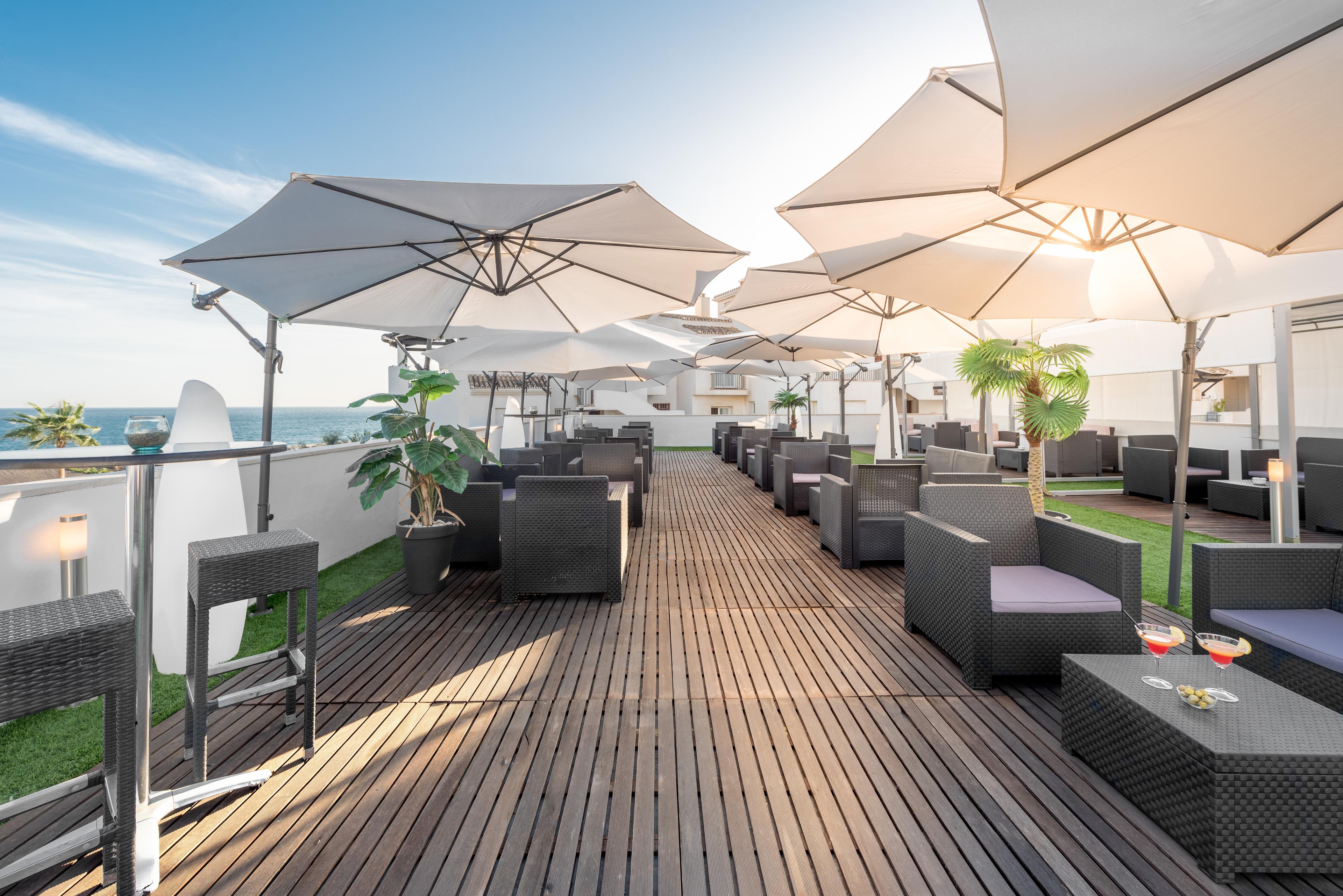 Rooftop lounging area at VIK Gran Hotel Costa del Sol