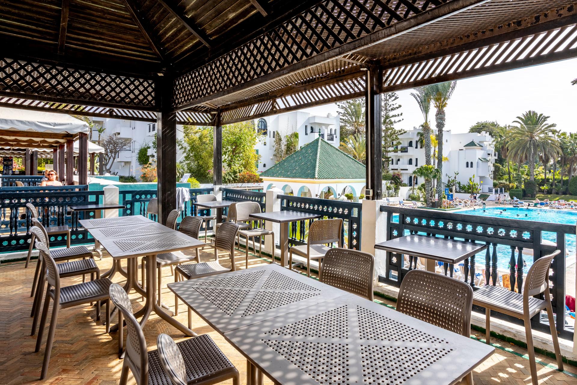 Outdoor poolside dining area