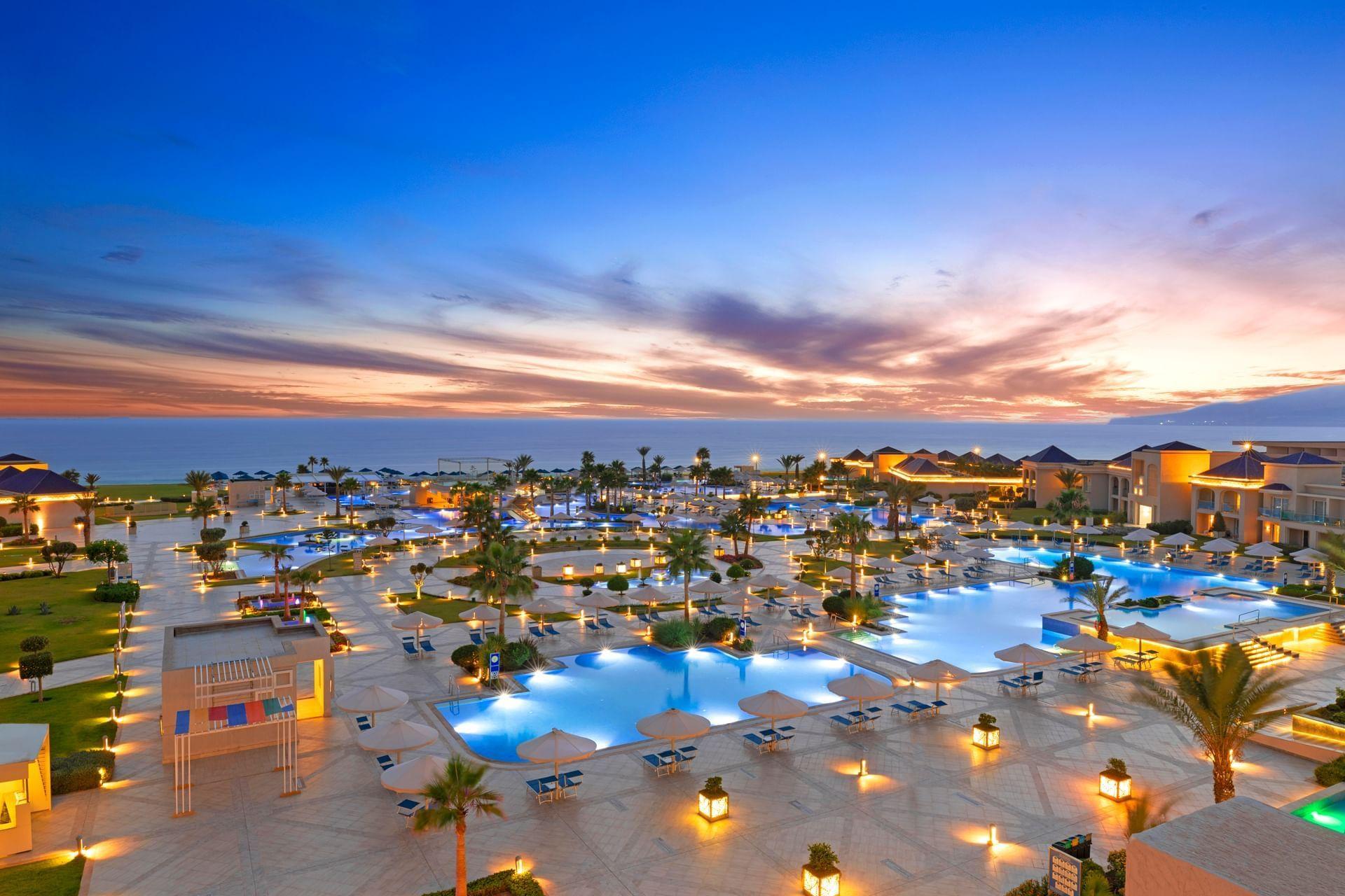 Overhead view of White Beach Resort Taghazout lit up at evening