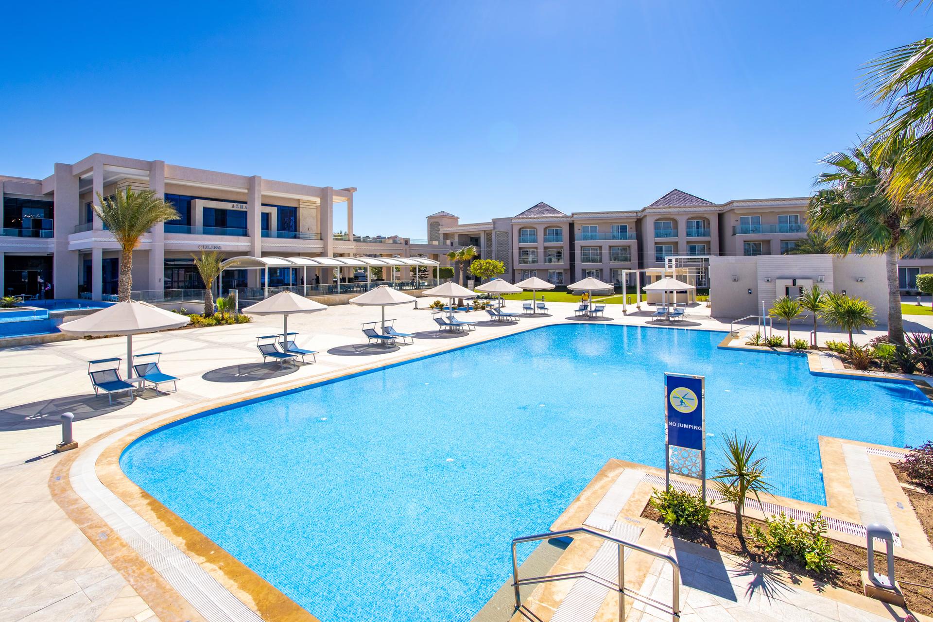 Outdoor swimming pool at White Beach Resort Taghazout