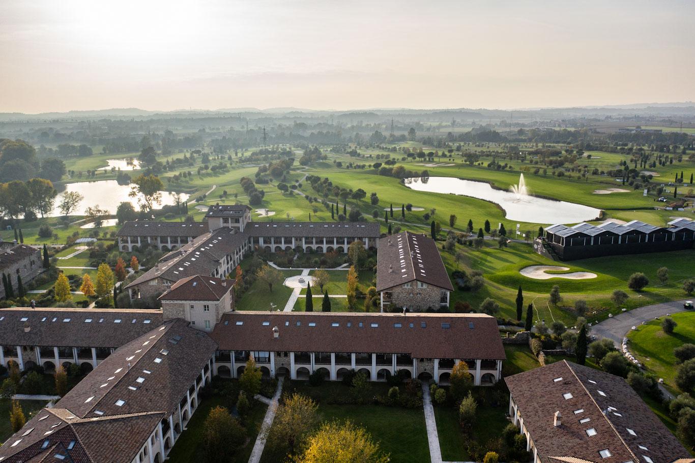 Aerial view looking down on the Chervò Golf Hotel Spa & Resort estate