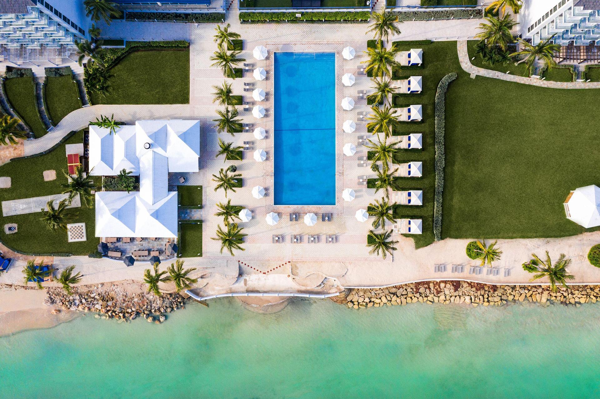 Overhead view of the outdoor swimming pool at Hilton Rose Hall Resort & Spa