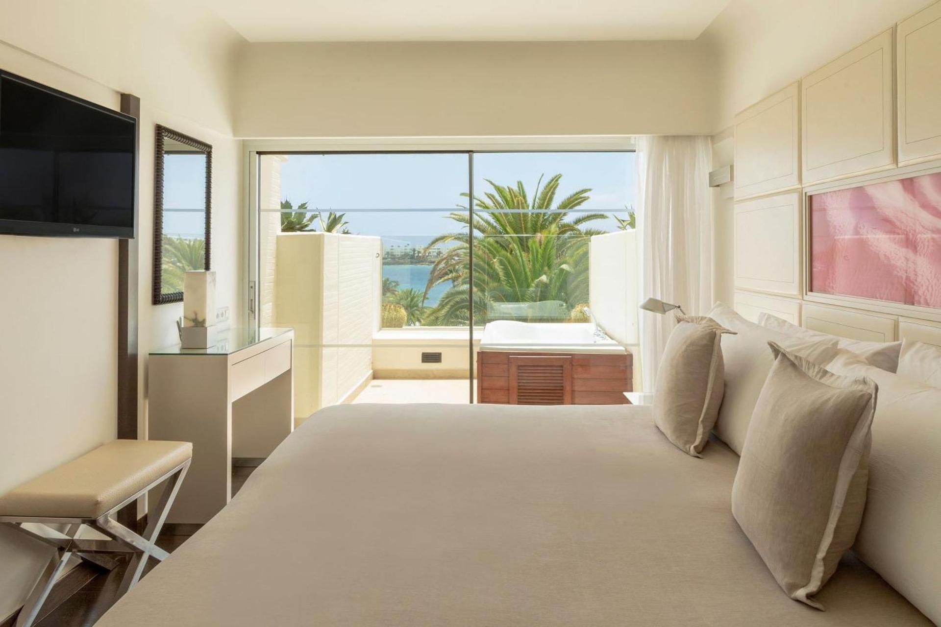 Spacious double bed suite with a personal jacuzzi on the balcony