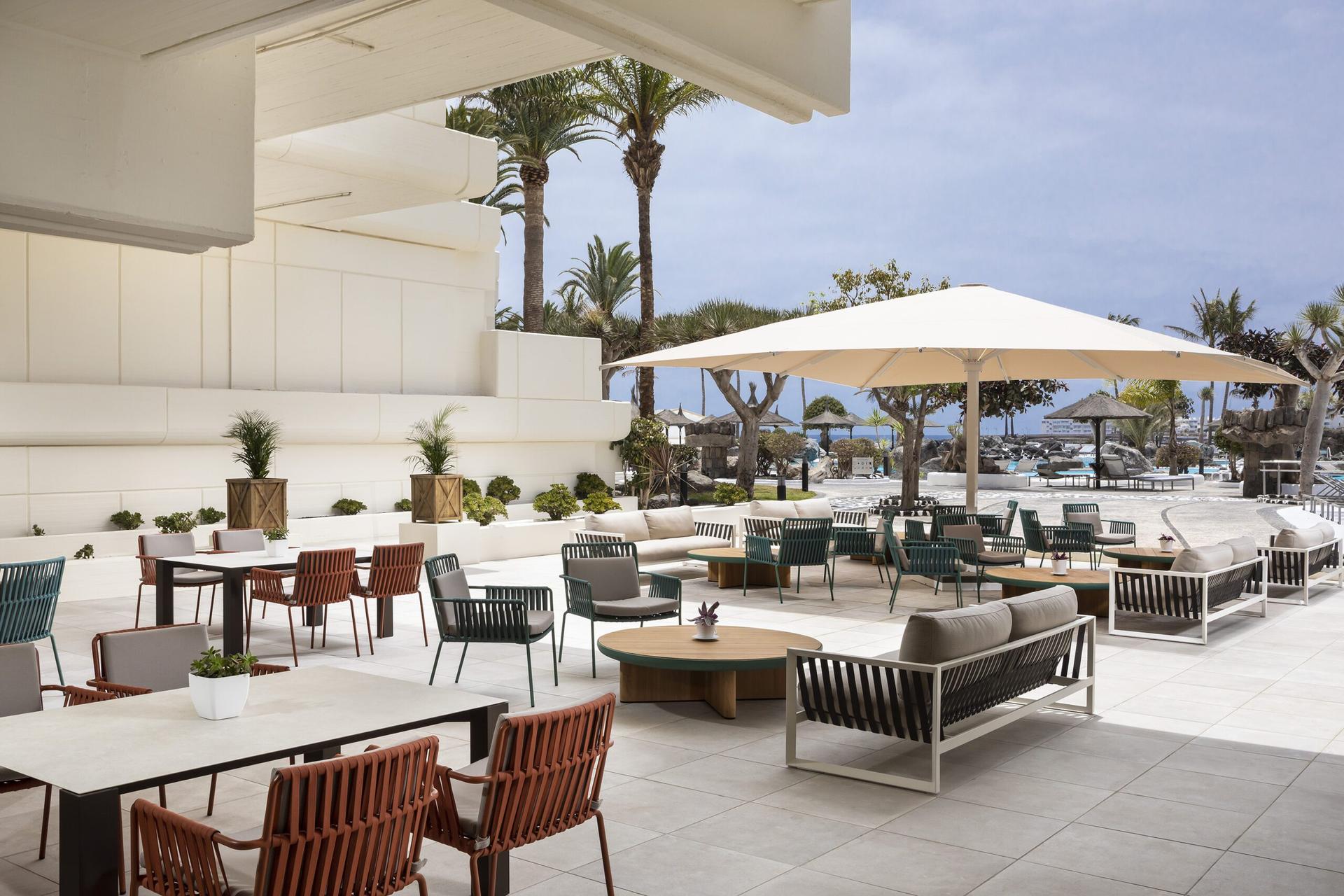 Outdoor dining and lounging area at Paradisus Salinas Lanzarote