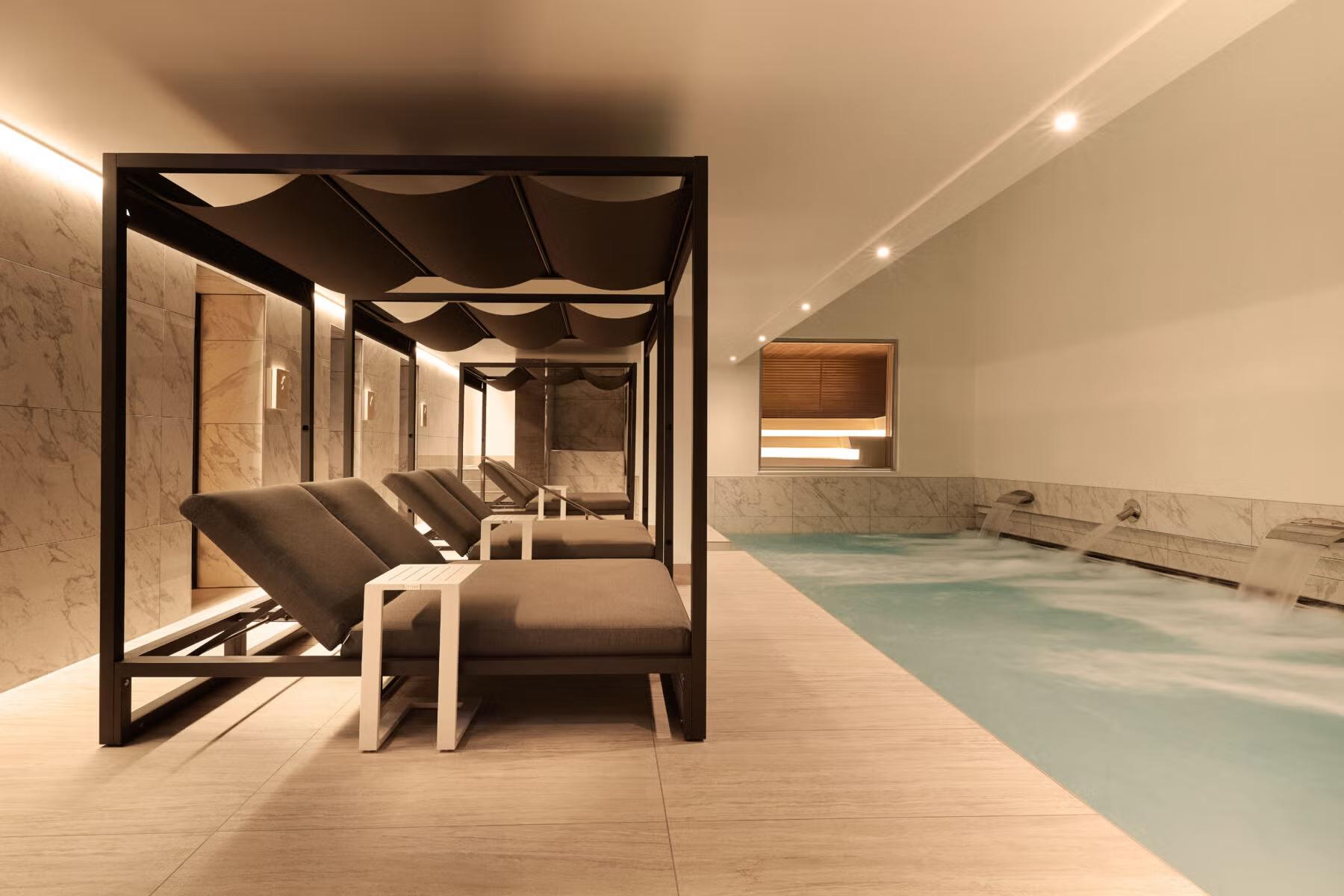 Indoor pool lined with sunbeds as part of the indoor pool at Paradisus Salinas Lanzarote
