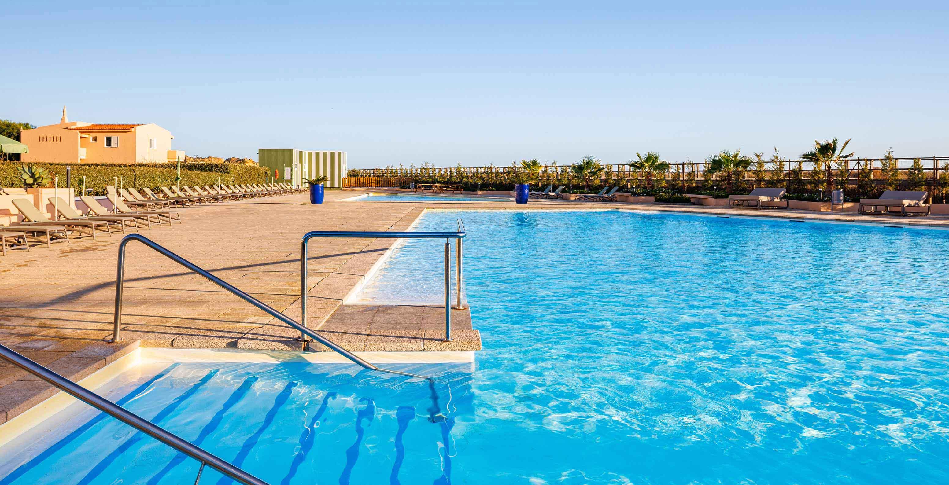 Outdoor swimming pool at Pestana Alvor Beach Villas